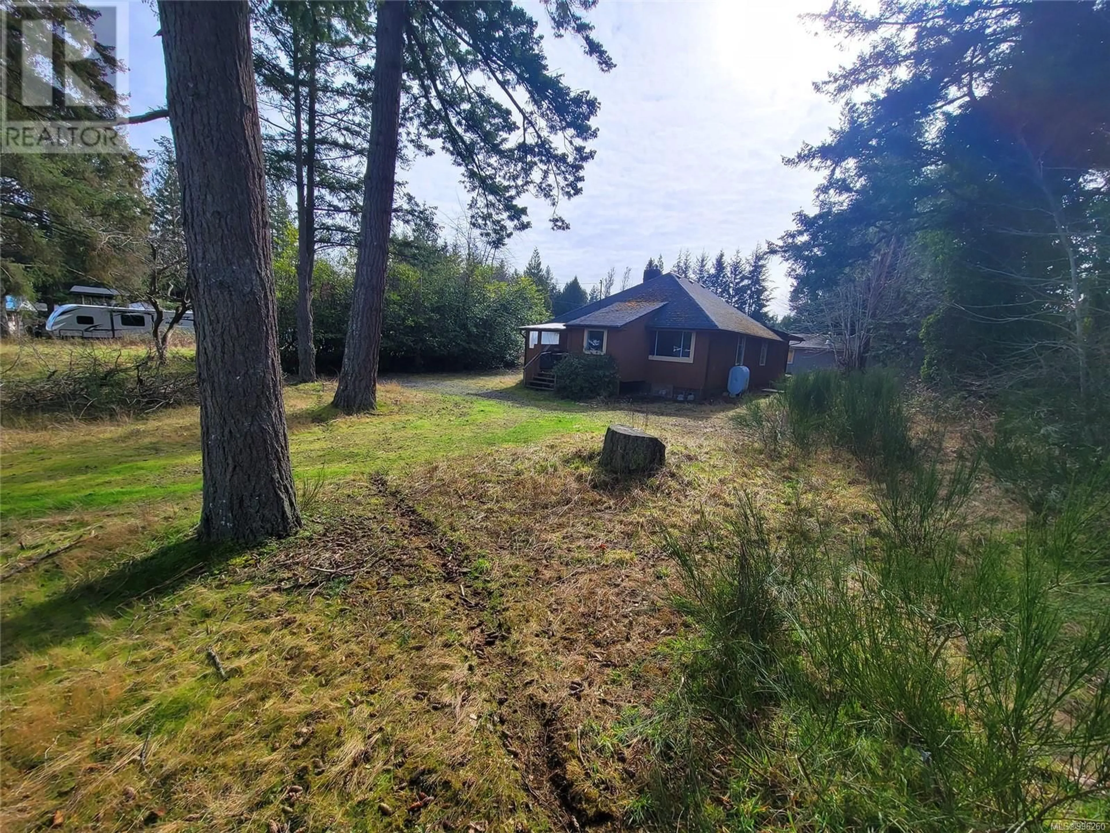 A pic from outside/outdoor area/front of a property/back of a property/a pic from drone, forest/trees view for 1625 RYAN ROAD EAST, Comox British Columbia V9M4C6