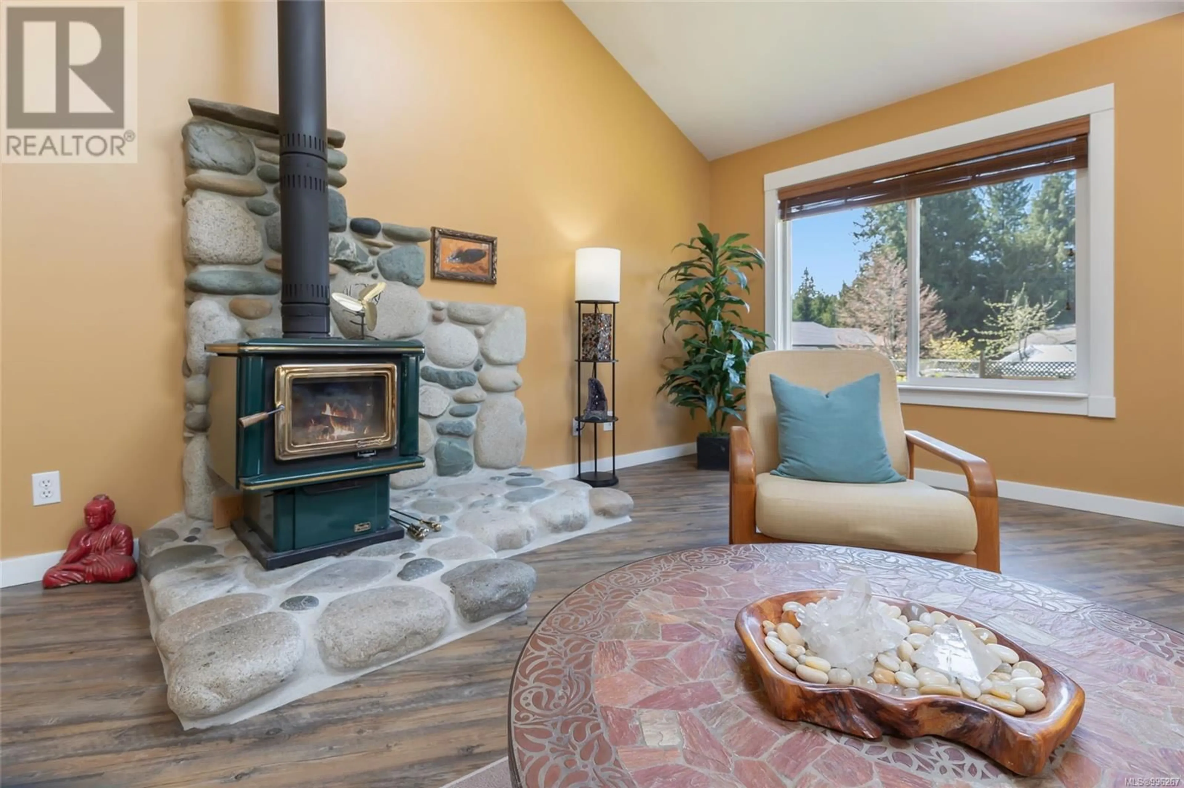 Living room with furniture, ceramic/tile floor for 491 MILLER PLACE, Qualicum Beach British Columbia V9K2A4