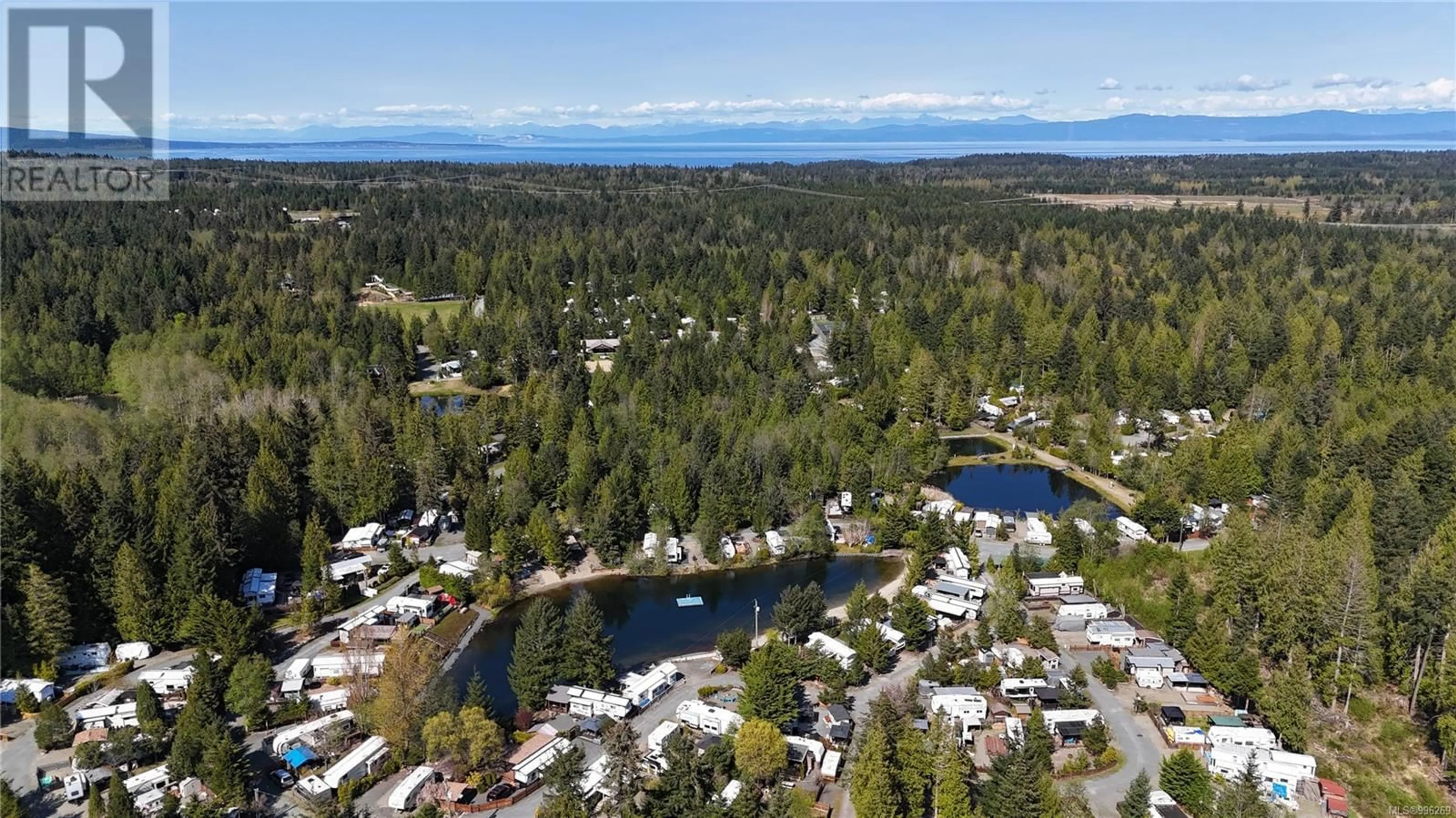 A pic from outside/outdoor area/front of a property/back of a property/a pic from drone, water/lake/river/ocean view for B38 - 2650 TURNBULL ROAD, Qualicum Beach British Columbia V9K2R2