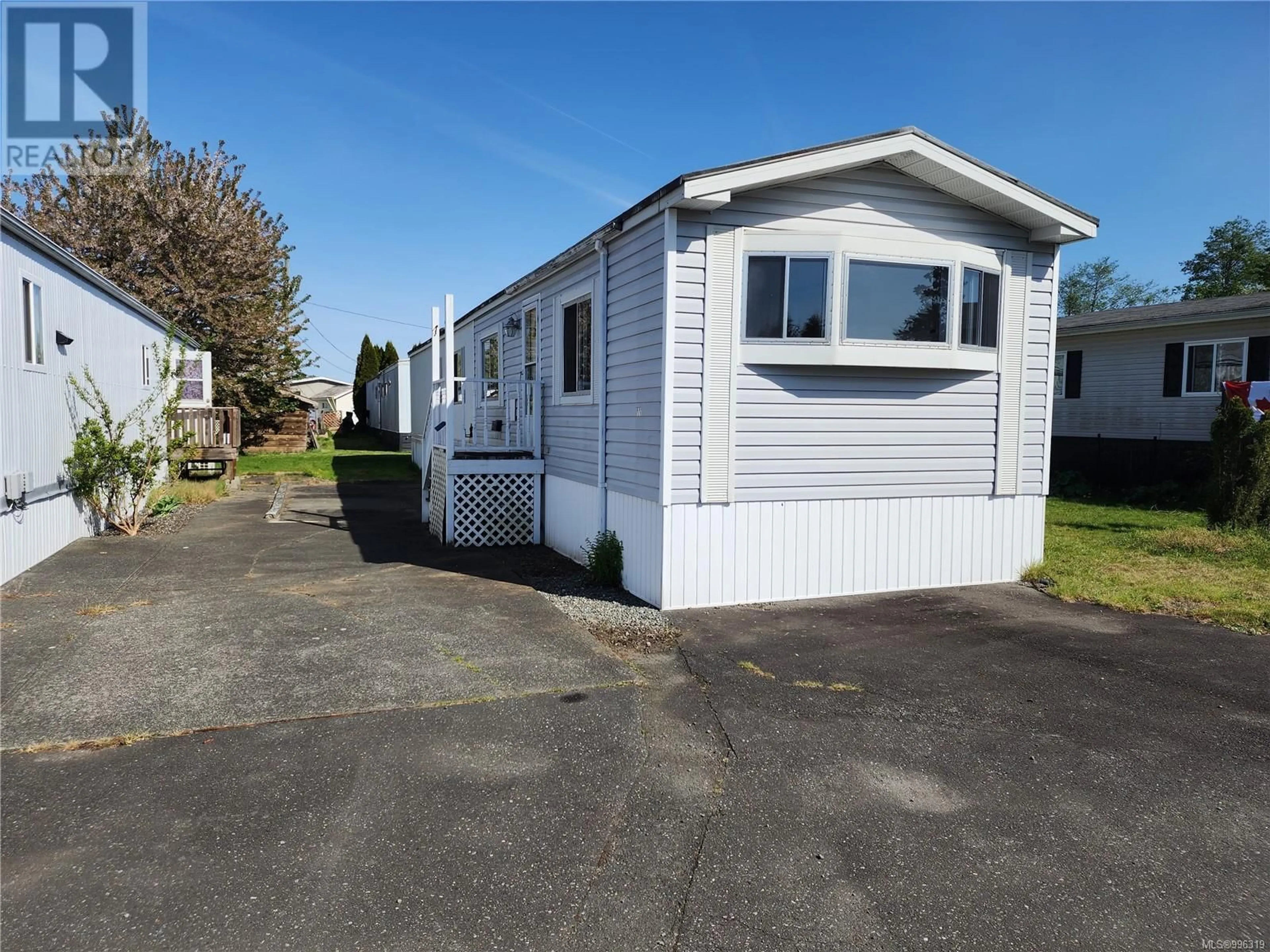 Home with vinyl exterior material, street for 11 - 1451 PERKINS ROAD, Campbell River British Columbia V9W4R8