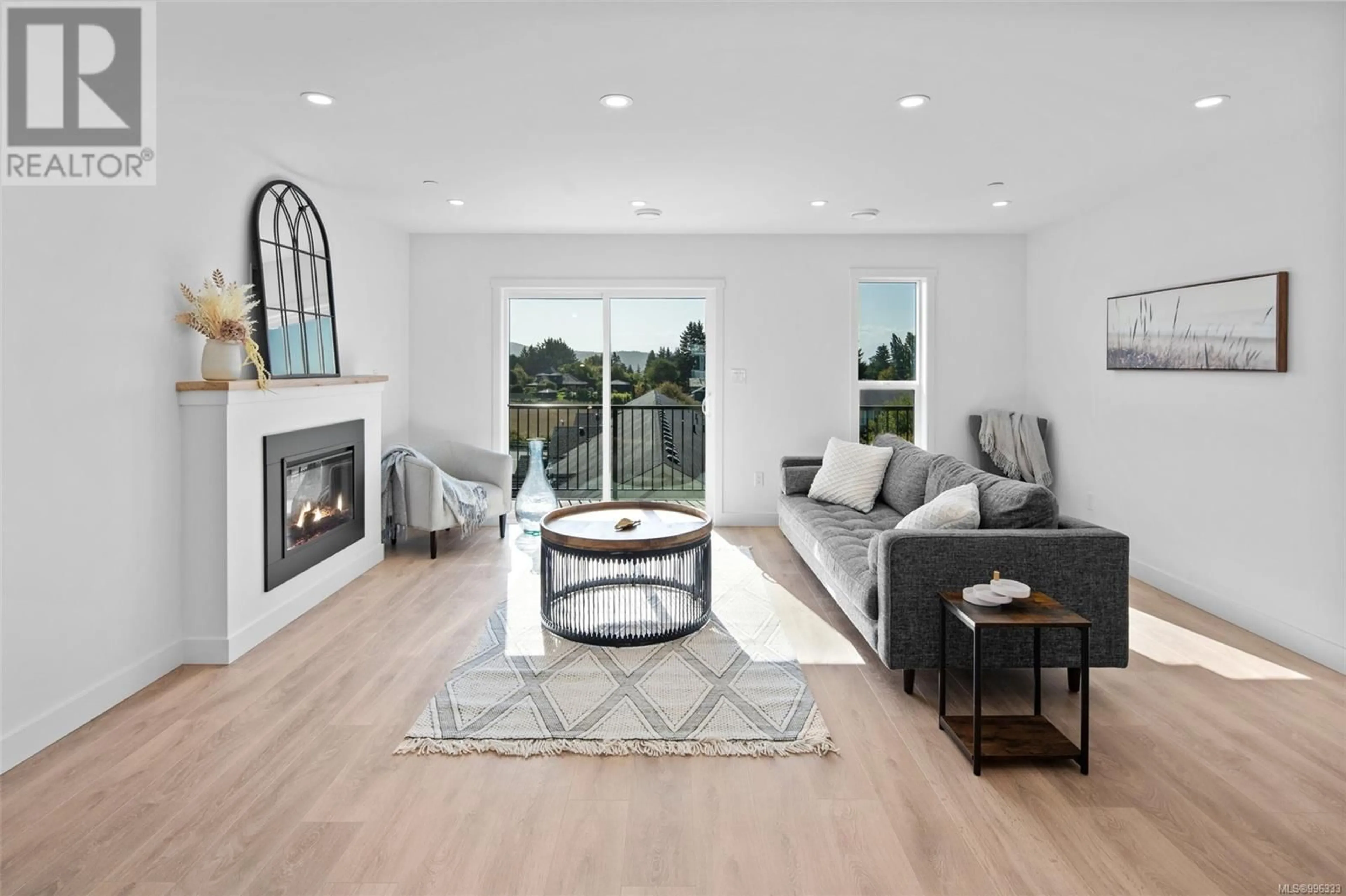 Living room with furniture, wood/laminate floor for A - 2032 STONE HEARTH LANE, Sooke British Columbia V9Z1L3
