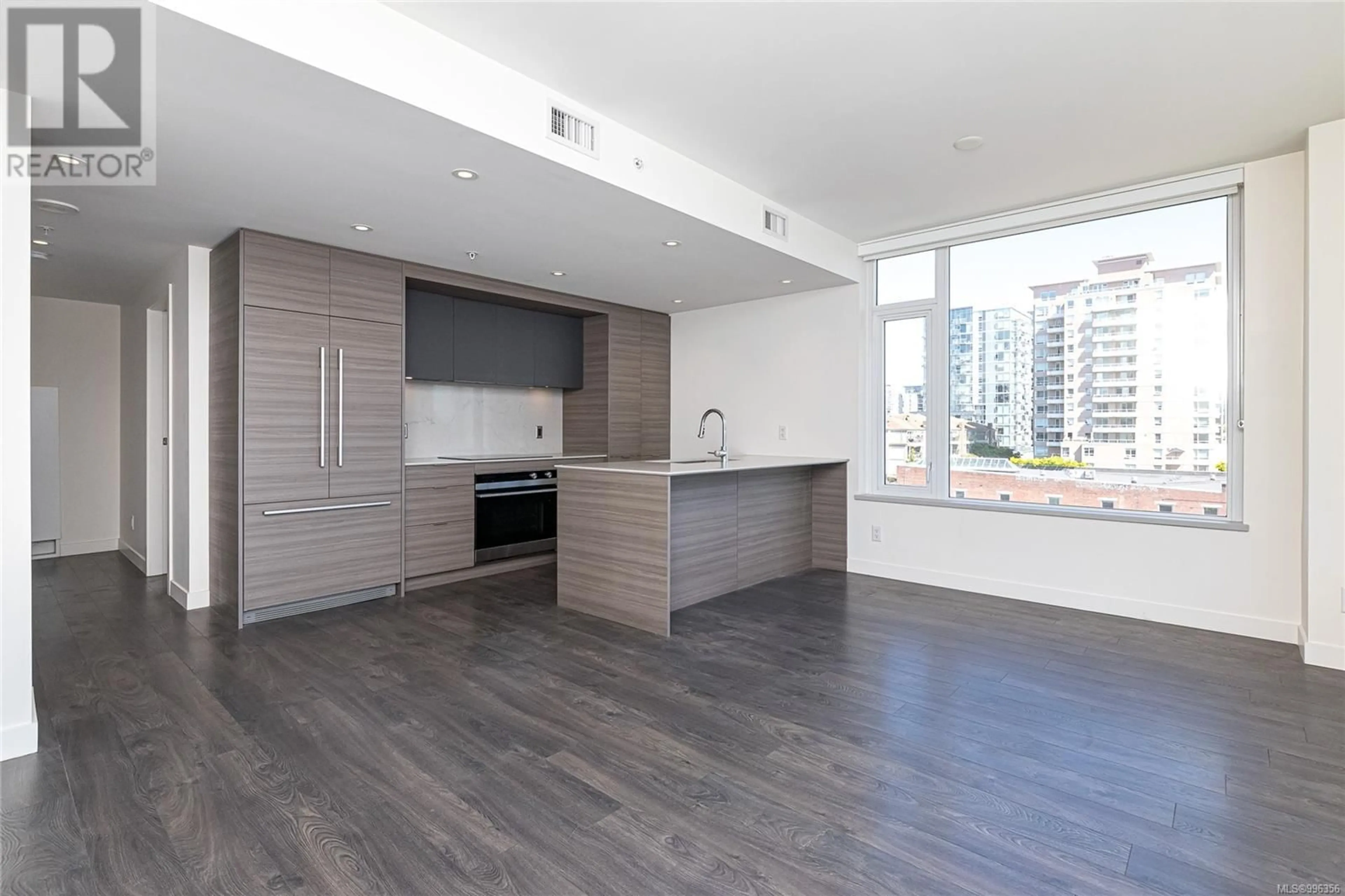 Open concept kitchen, wood/laminate floor for 608 - 848 YATES STREET, Victoria British Columbia V8W0G2
