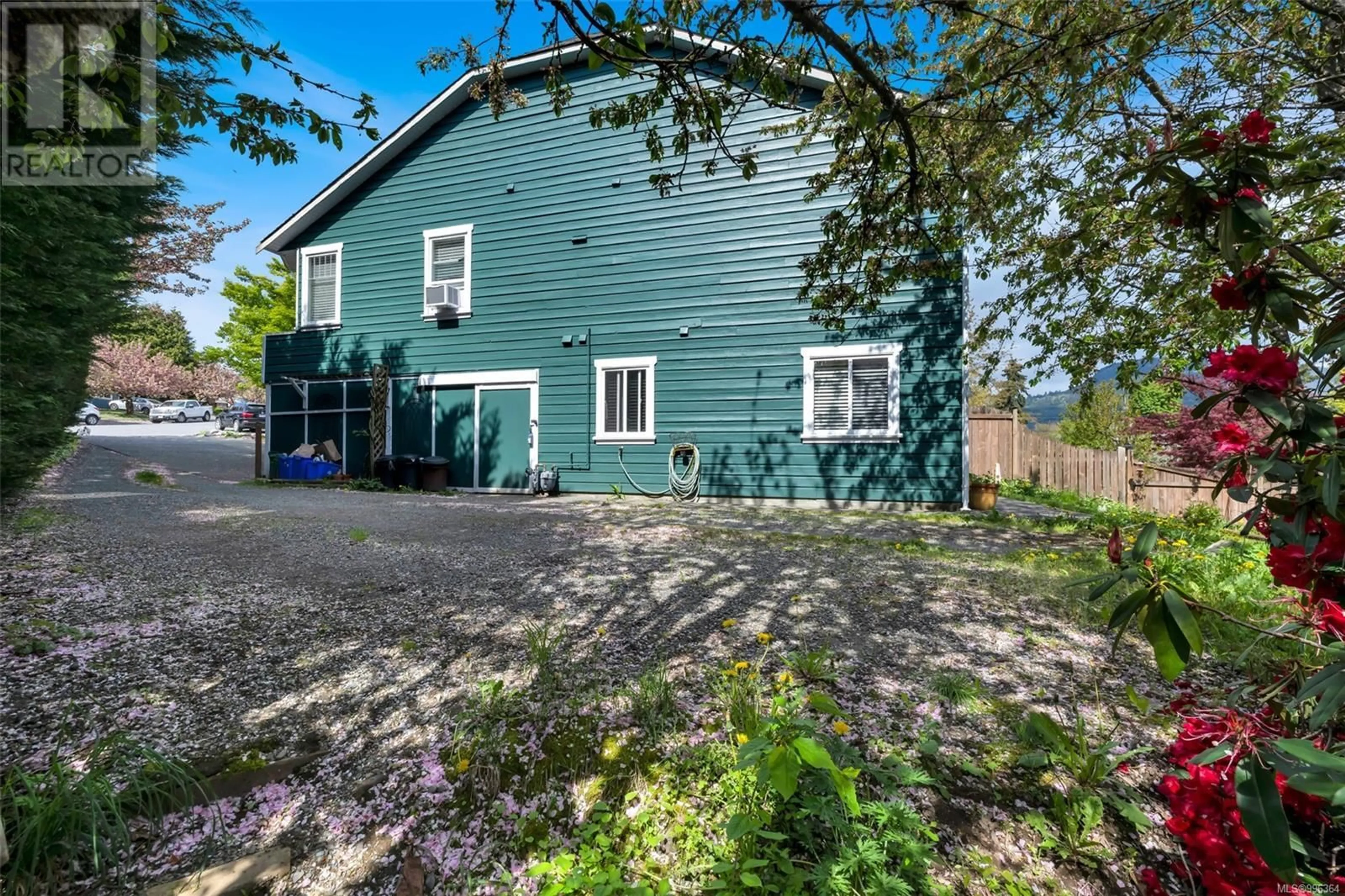 A pic from outside/outdoor area/front of a property/back of a property/a pic from drone, street for 6105 WESTRIDGE ROAD, Duncan British Columbia V9L5K7