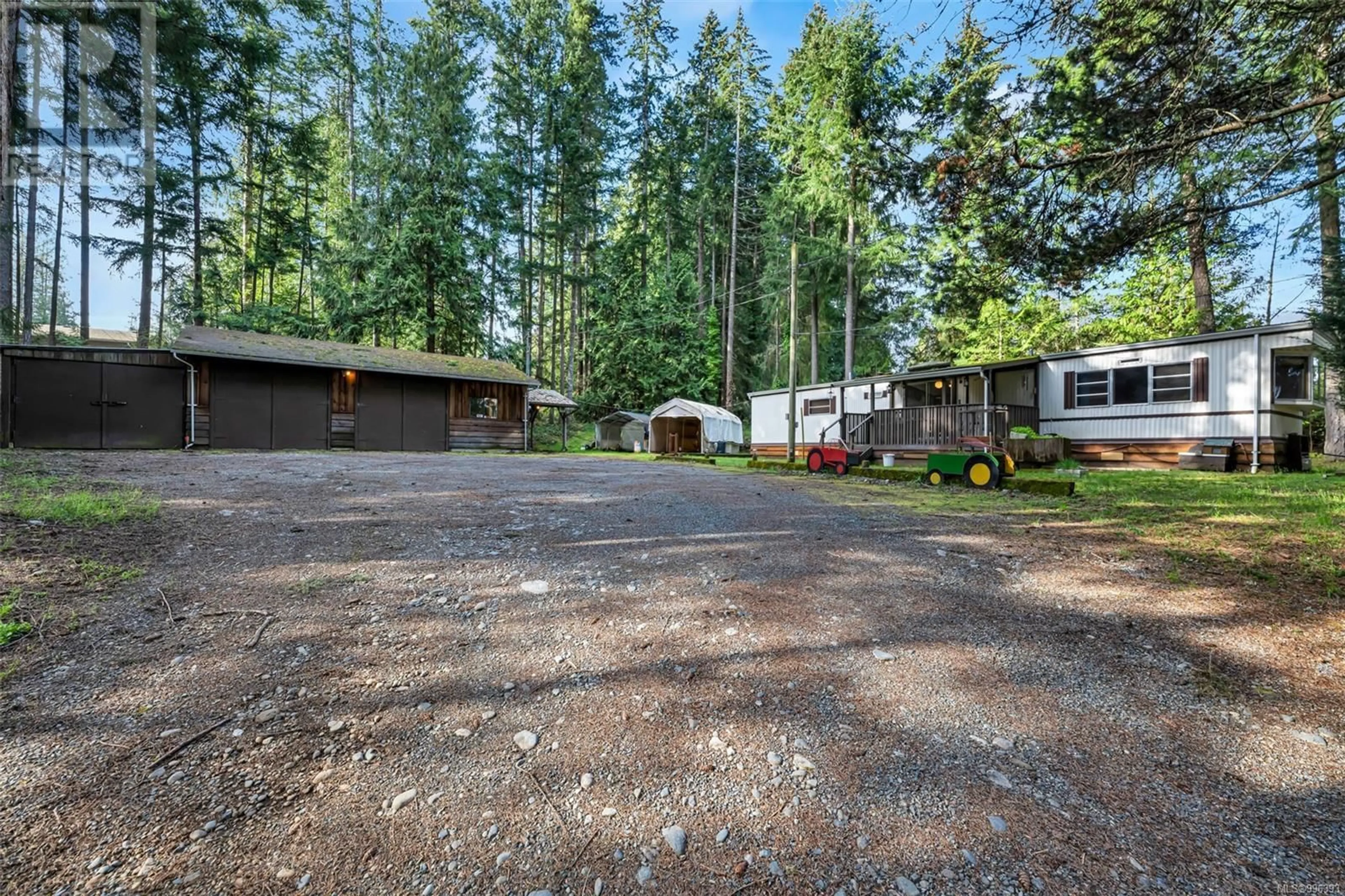 A pic from outside/outdoor area/front of a property/back of a property/a pic from drone, forest/trees view for 1066 BRAITHWAITE DRIVE, Cobble Hill British Columbia V8H0E2