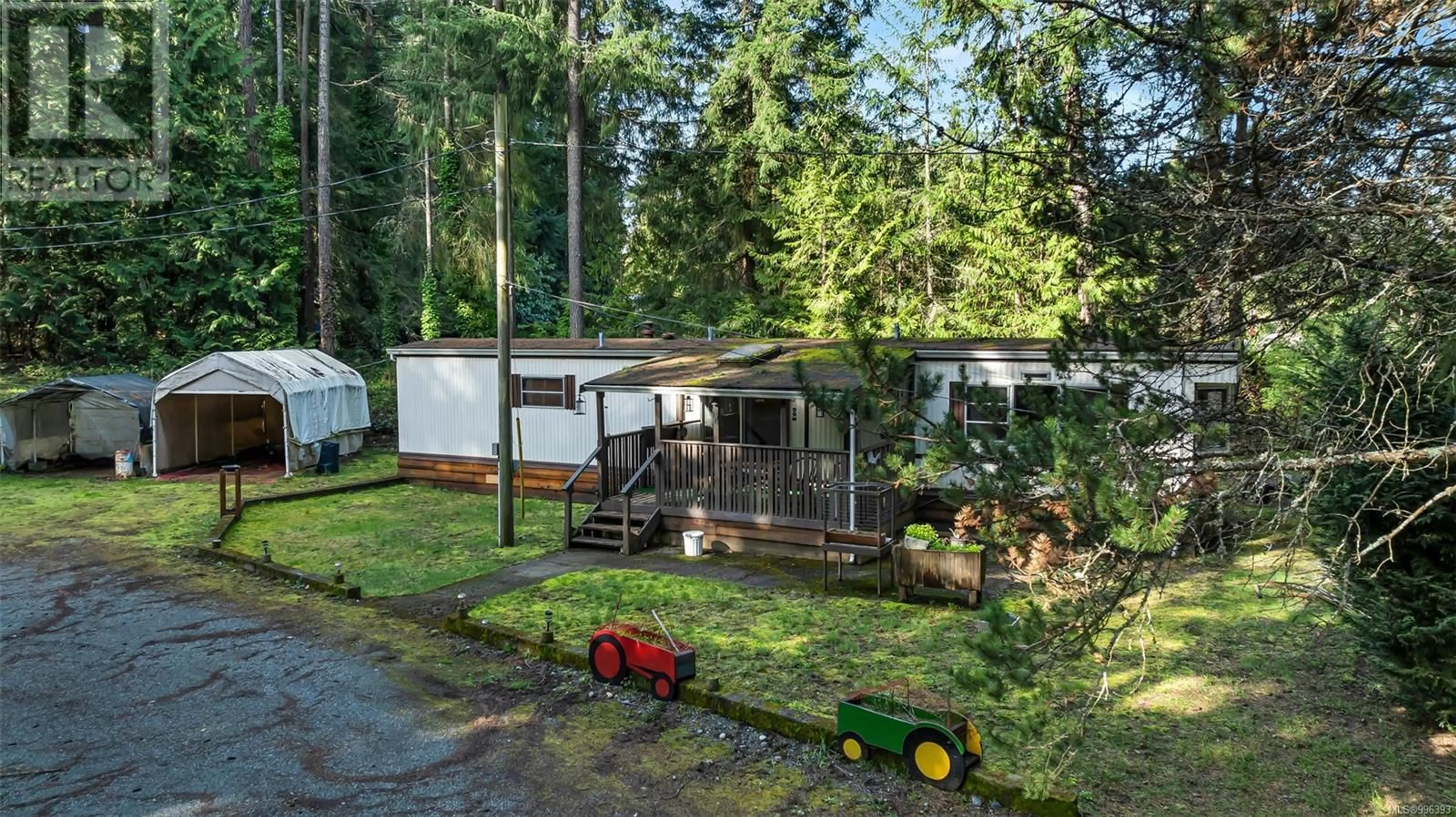 A pic from outside/outdoor area/front of a property/back of a property/a pic from drone, forest/trees view for 1066 BRAITHWAITE DRIVE, Cobble Hill British Columbia V8H0E2