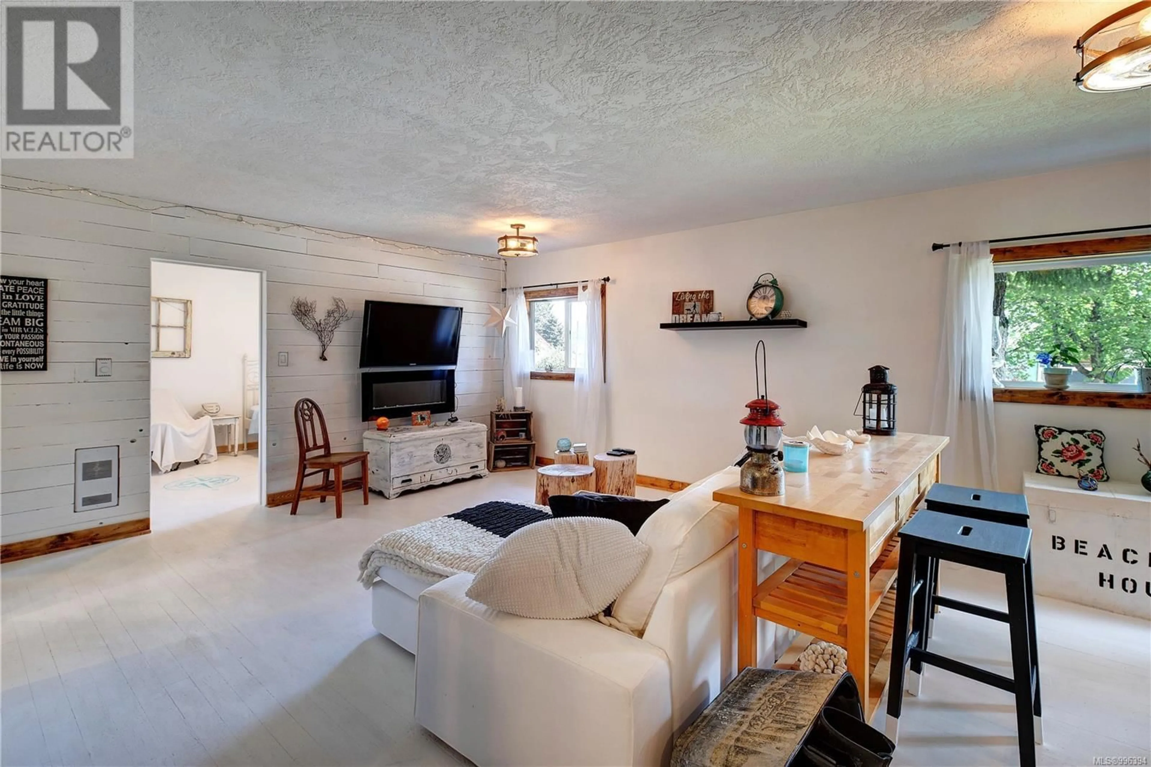 Living room with furniture, ceramic/tile floor for 6816 FIRST STREET, Honeymoon Bay British Columbia V0R1Y0