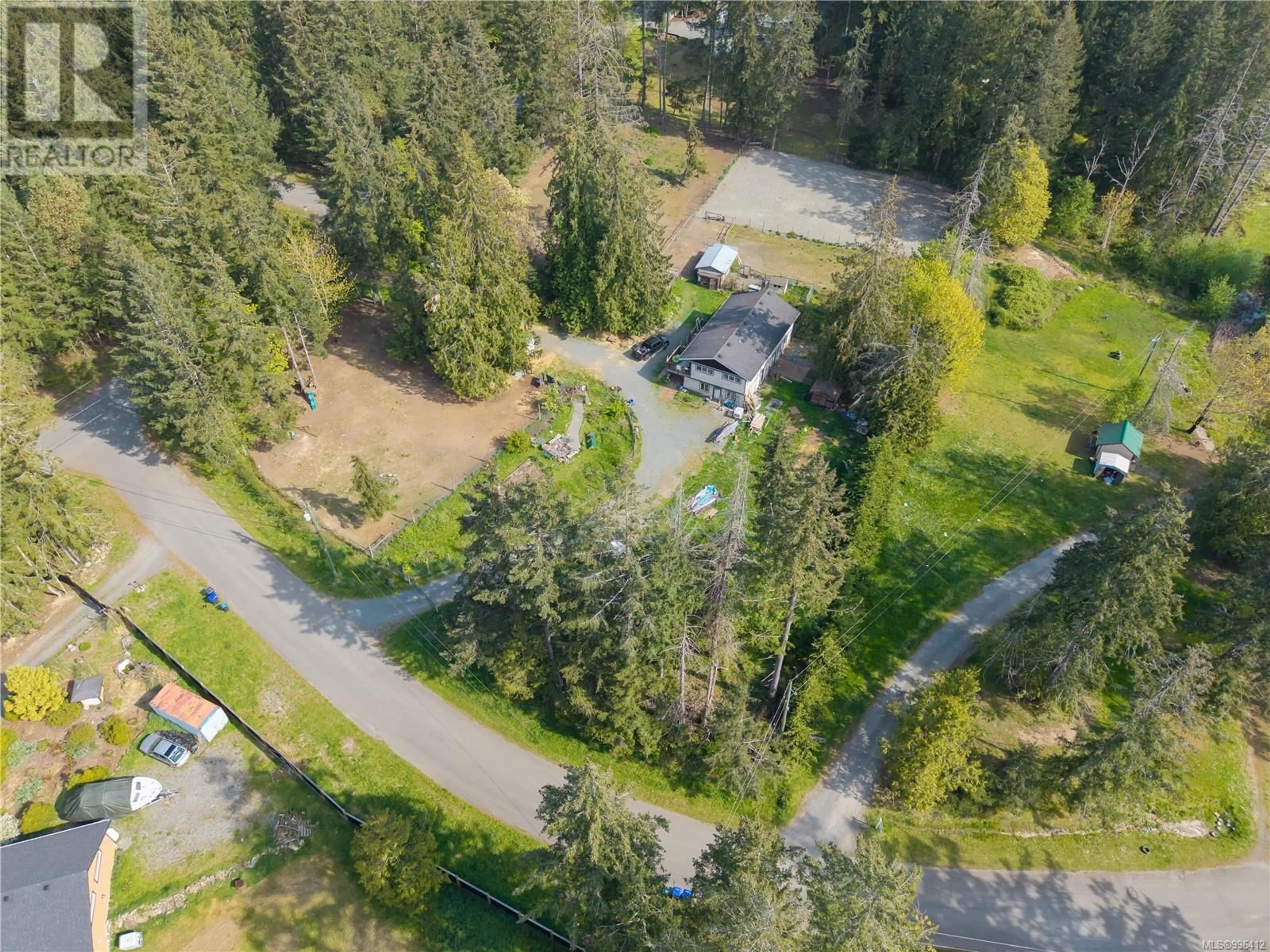 A pic from outside/outdoor area/front of a property/back of a property/a pic from drone, forest/trees view for 3455 MCGUIRE WAY, Nanaimo British Columbia V9G1C4
