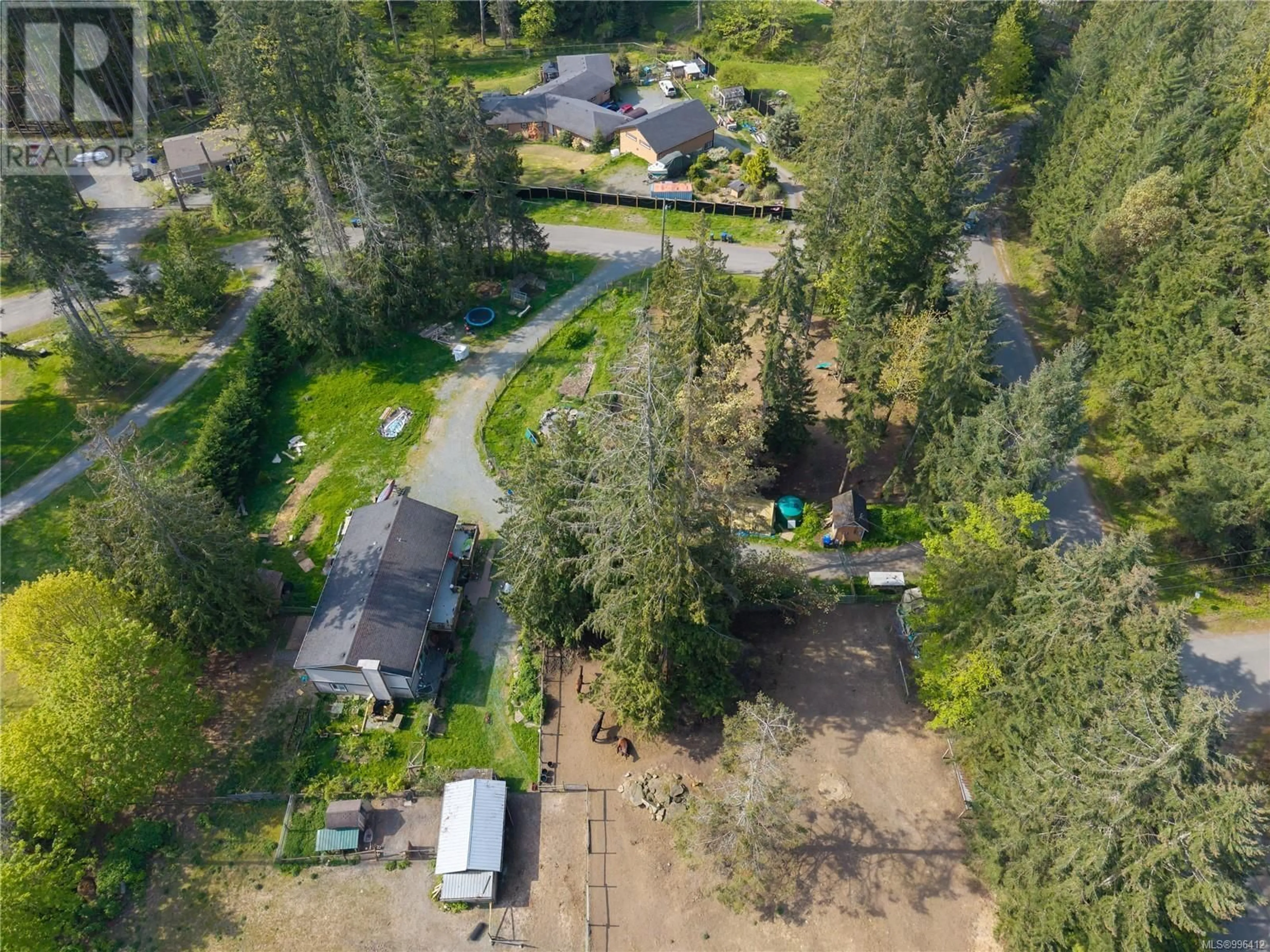 A pic from outside/outdoor area/front of a property/back of a property/a pic from drone, forest/trees view for 3455 MCGUIRE WAY, Nanaimo British Columbia V9G1C4