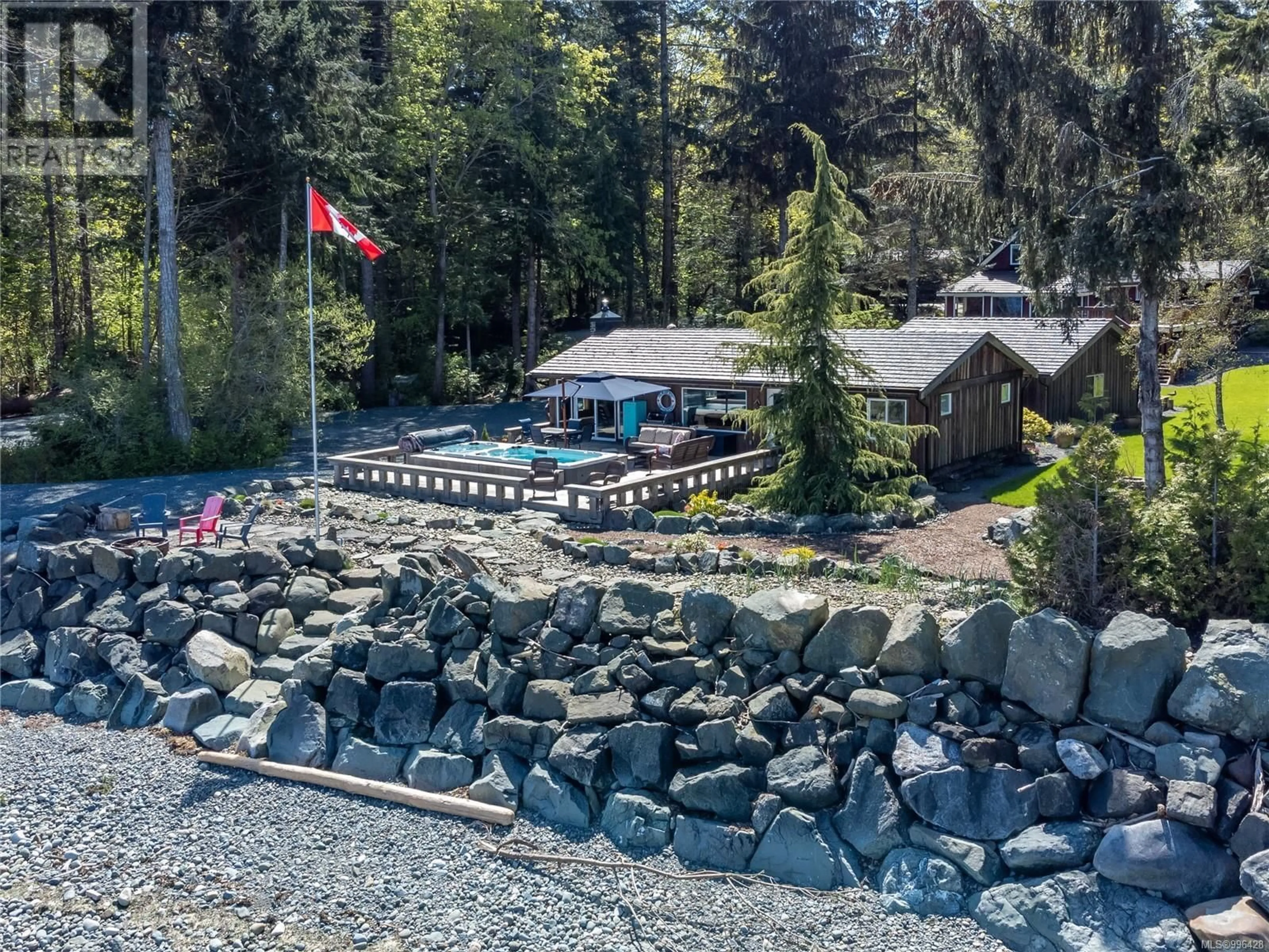 A pic from outside/outdoor area/front of a property/back of a property/a pic from drone, water/lake/river/ocean view for 4113 TWIGG ROAD, Campbell River British Columbia V9H1E9
