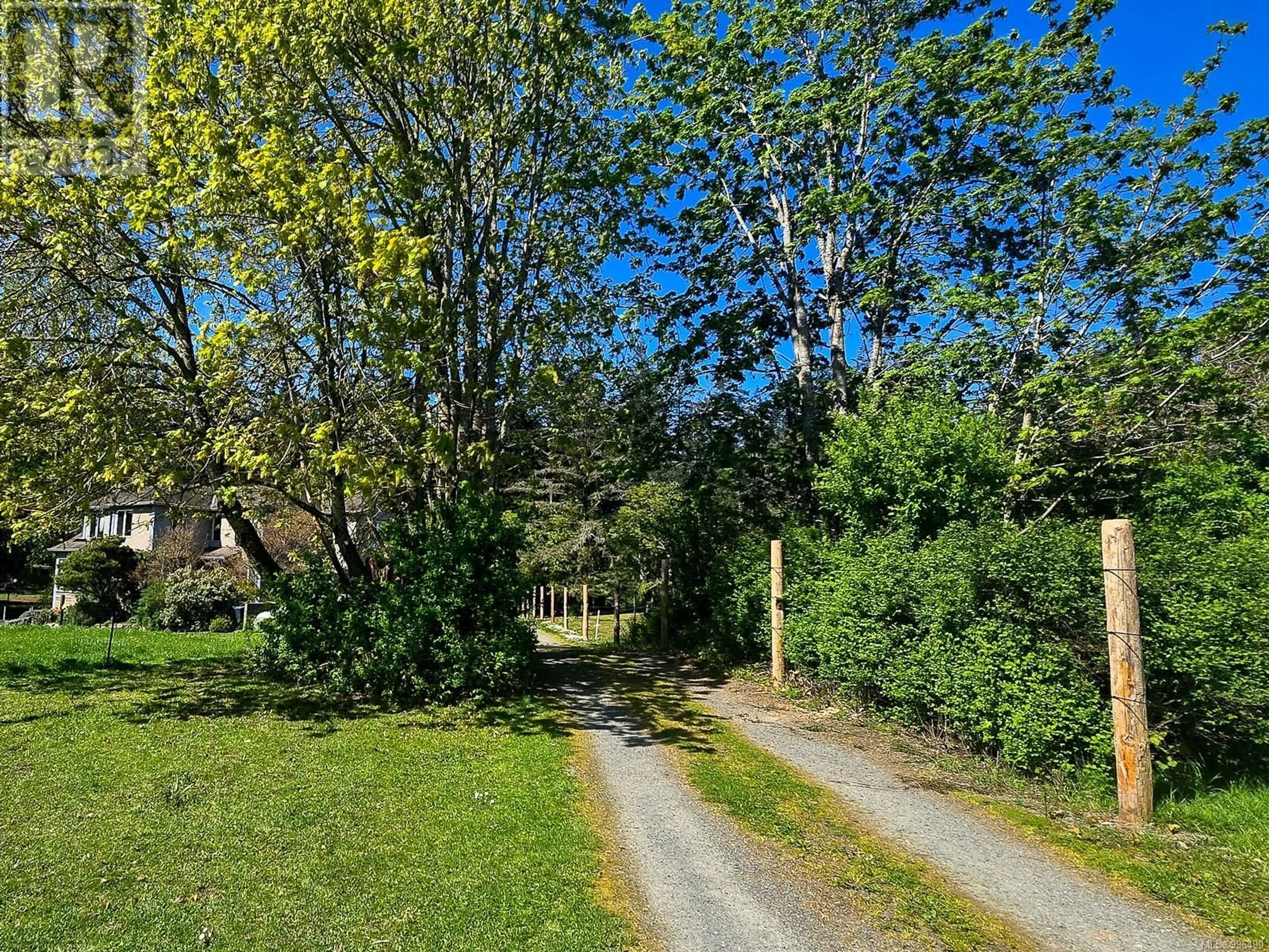 A pic from outside/outdoor area/front of a property/back of a property/a pic from drone, forest/trees view for 2035 PACE ROAD, Nanaimo British Columbia V9X1N8