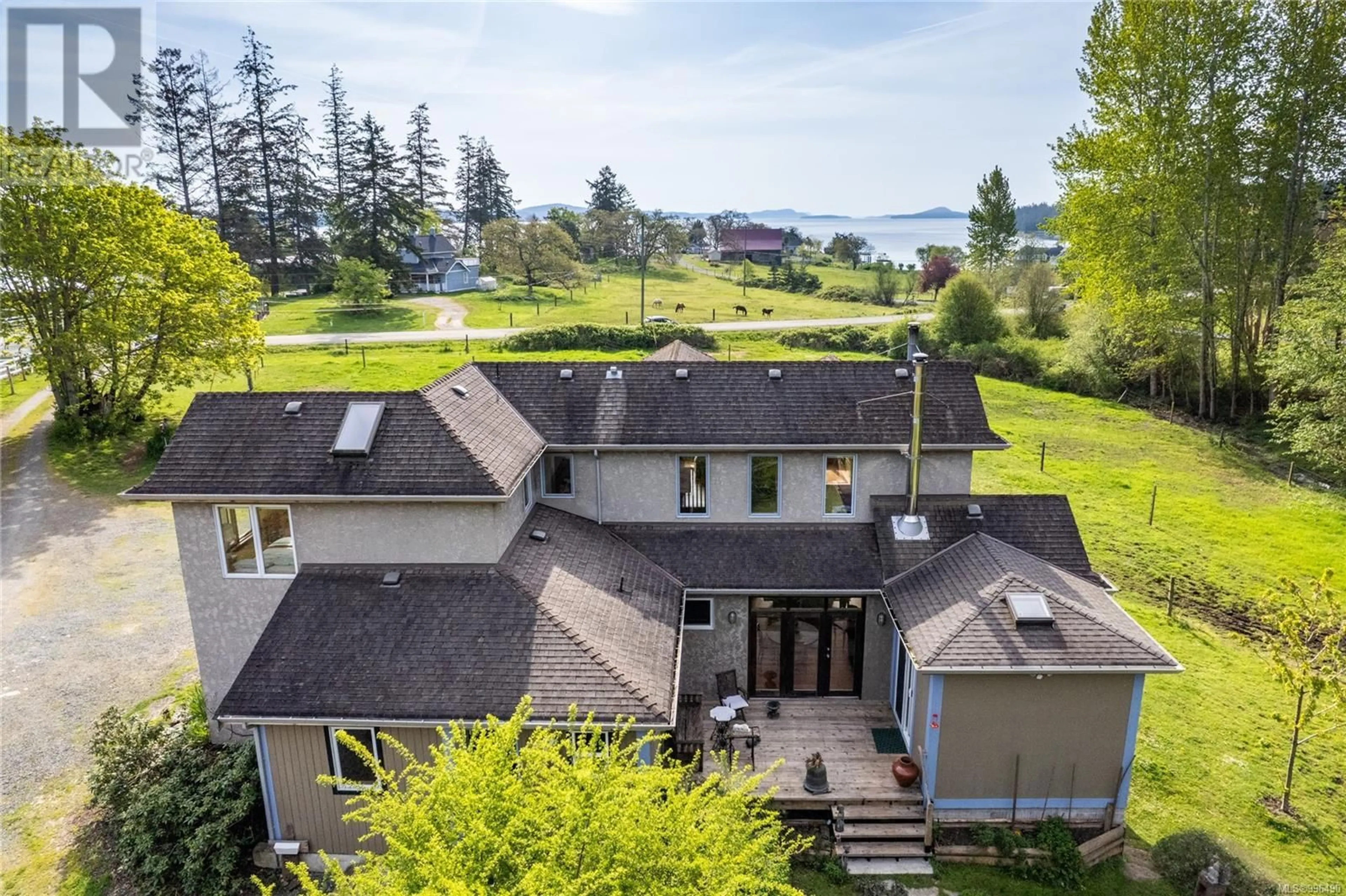 A pic from outside/outdoor area/front of a property/back of a property/a pic from drone, water/lake/river/ocean view for 2035 PACE ROAD, Nanaimo British Columbia V9X1N8
