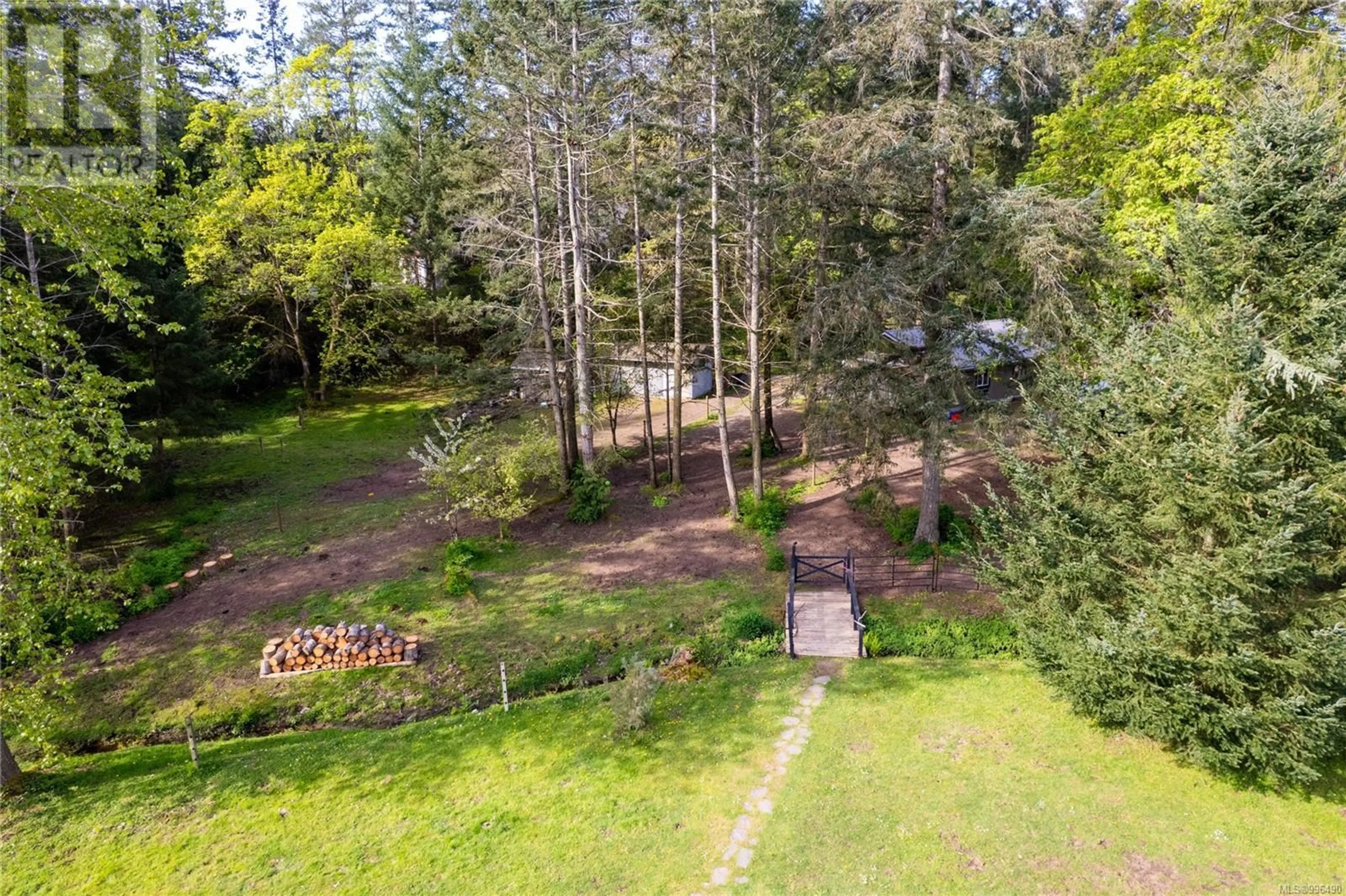A pic from outside/outdoor area/front of a property/back of a property/a pic from drone, forest/trees view for 2035 PACE ROAD, Nanaimo British Columbia V9X1N8