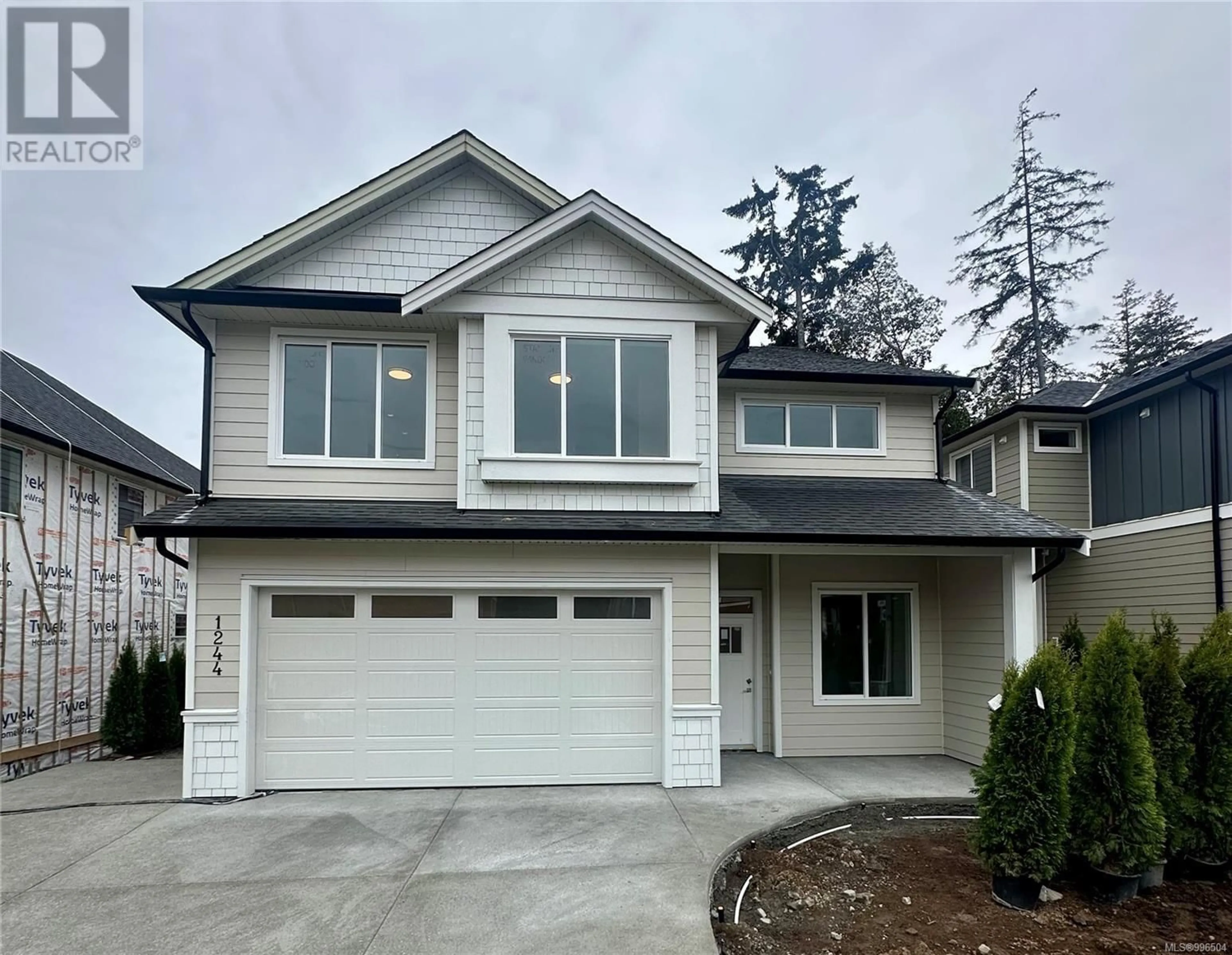 Home with vinyl exterior material, street for 1244 ASHMORE TERRACE, Langford British Columbia V9C0S6