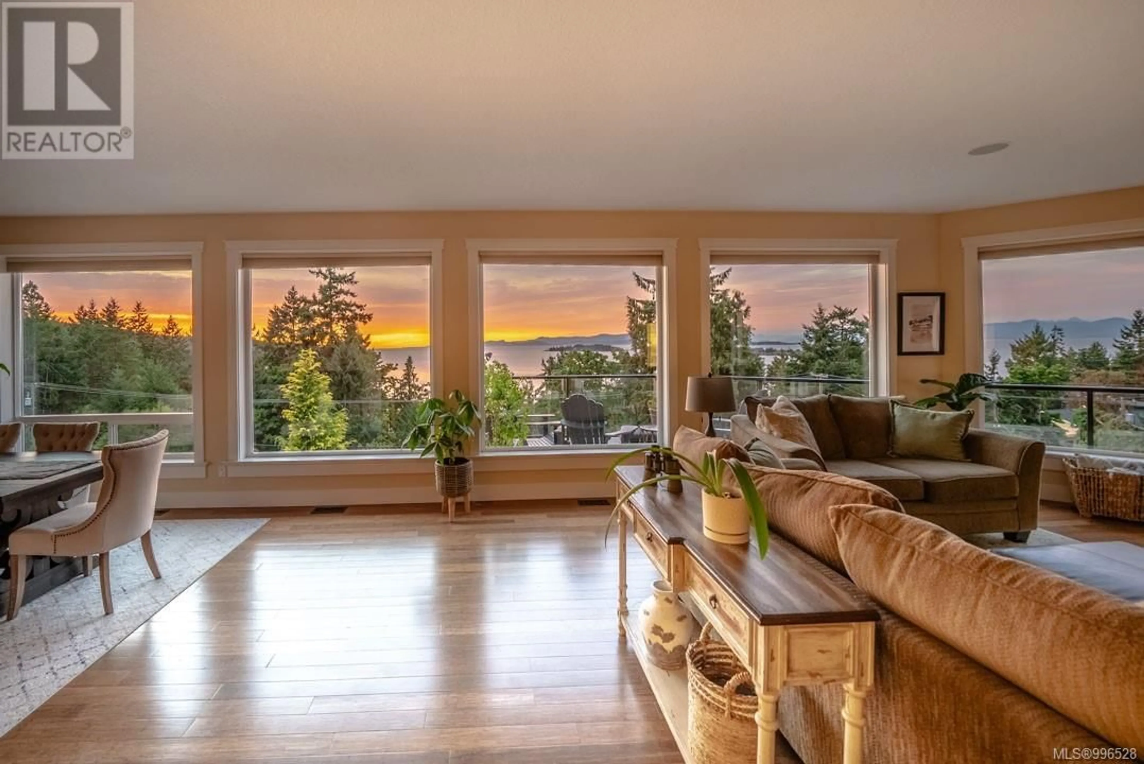 Living room with furniture, wood/laminate floor for 3182 DOLPHIN DRIVE, Nanoose Bay British Columbia V9P9J2