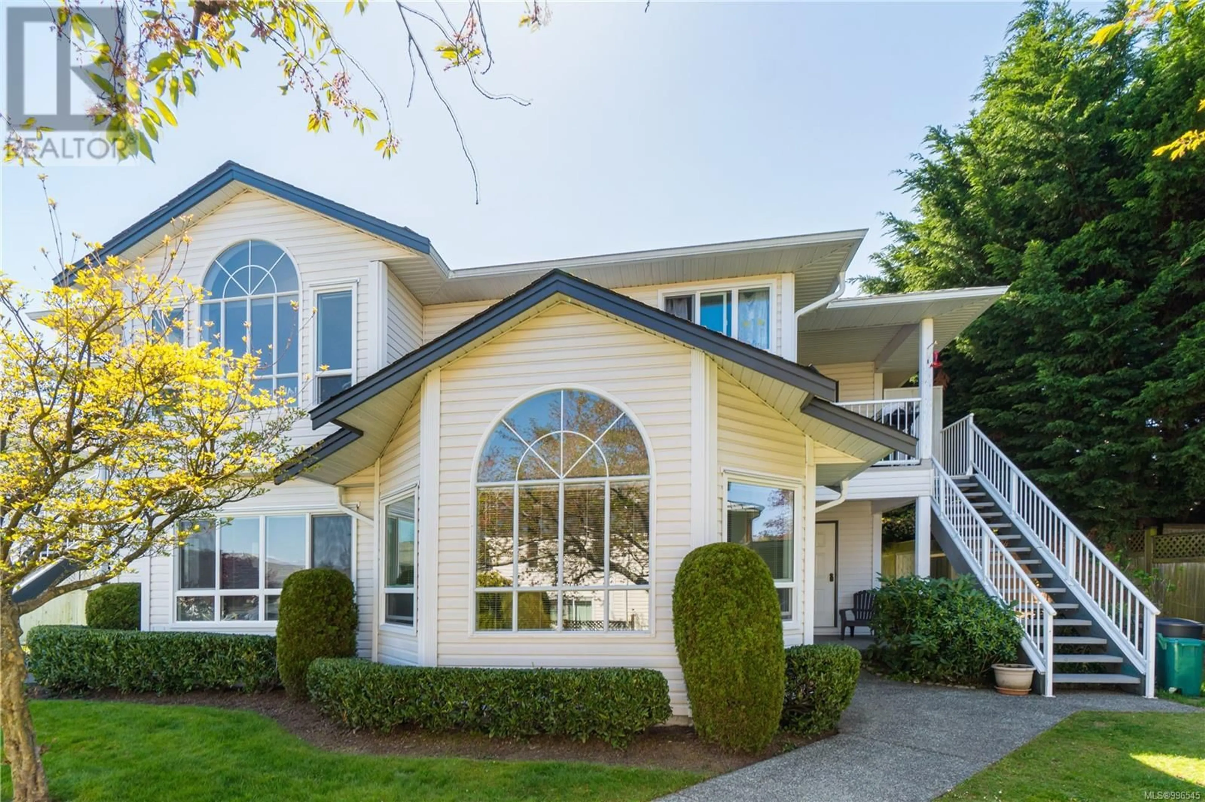 Home with vinyl exterior material, street for 7 - 6245 BLUEBACK ROAD, Nanaimo British Columbia V9V1N7