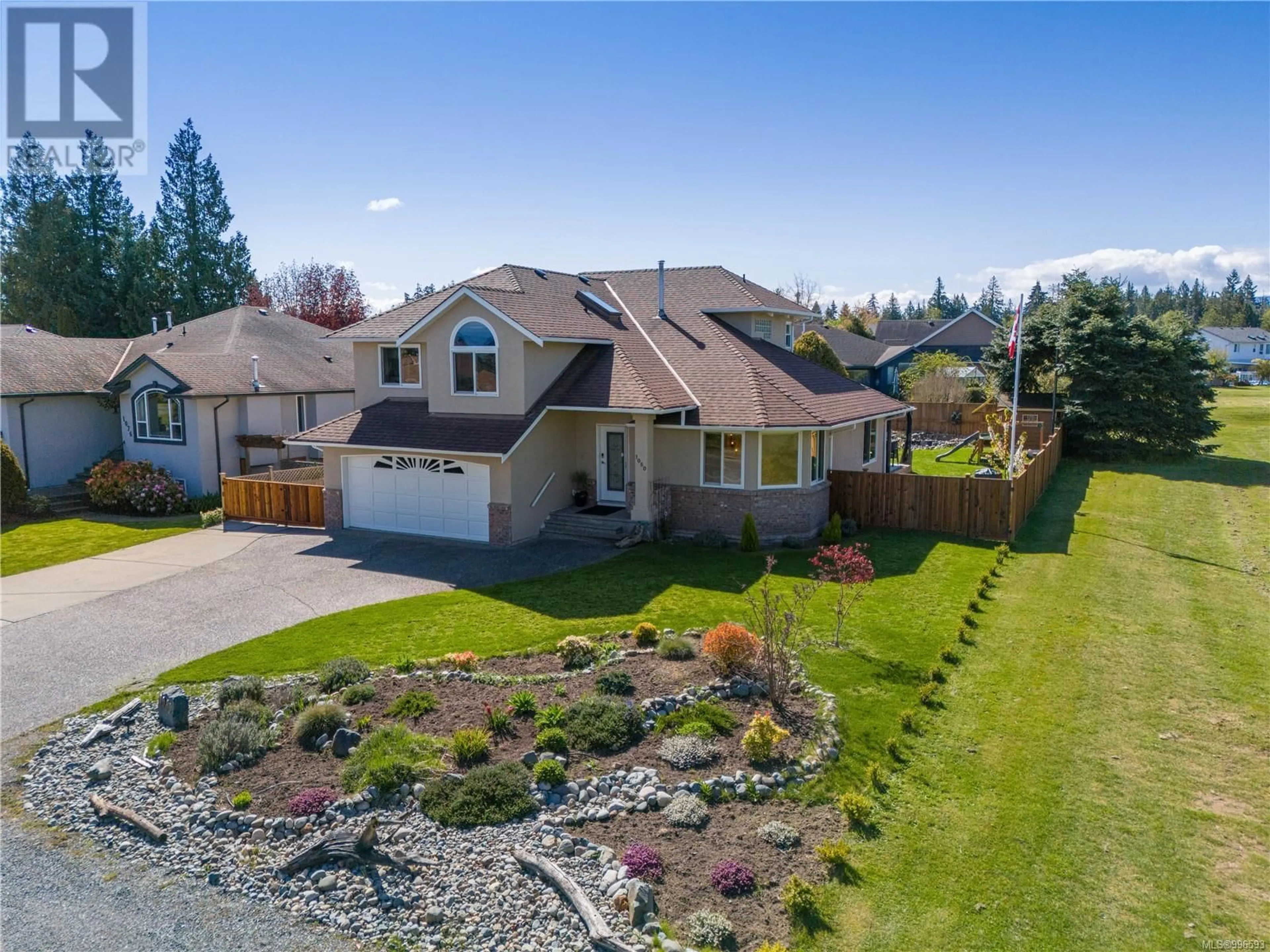 A pic from outside/outdoor area/front of a property/back of a property/a pic from drone, street for 1080 ROBERTON BOULEVARD, French Creek British Columbia V9P2P9