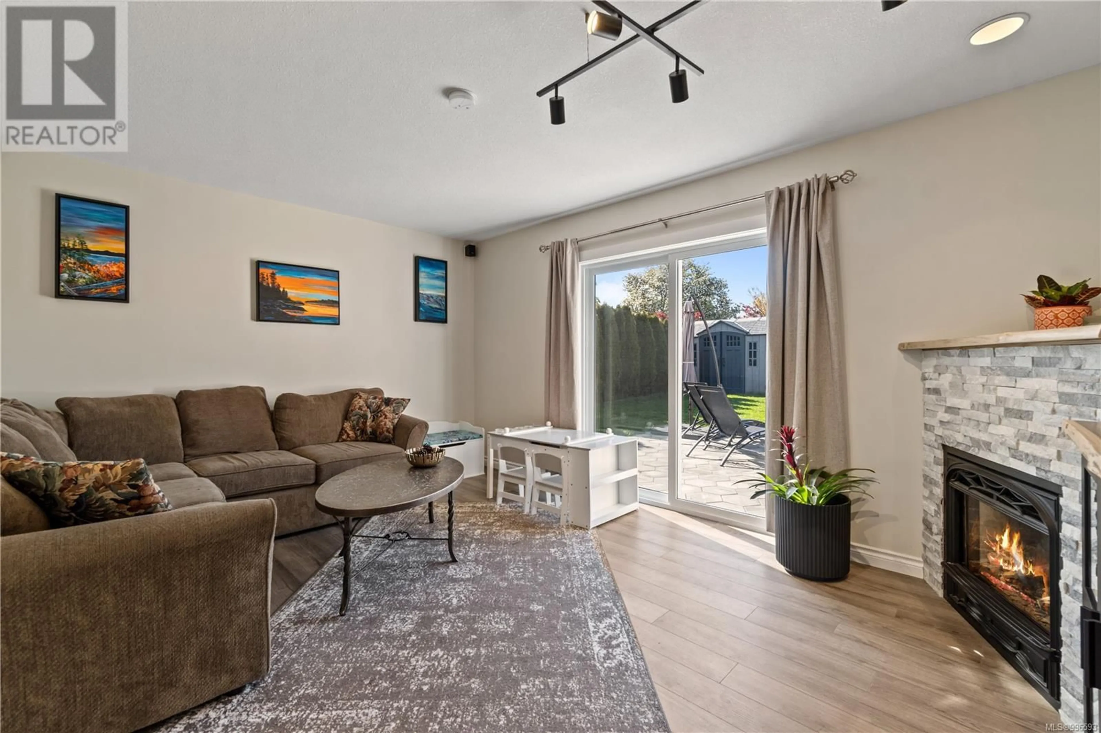 Living room with furniture, unknown for 1080 ROBERTON BOULEVARD, French Creek British Columbia V9P2P9
