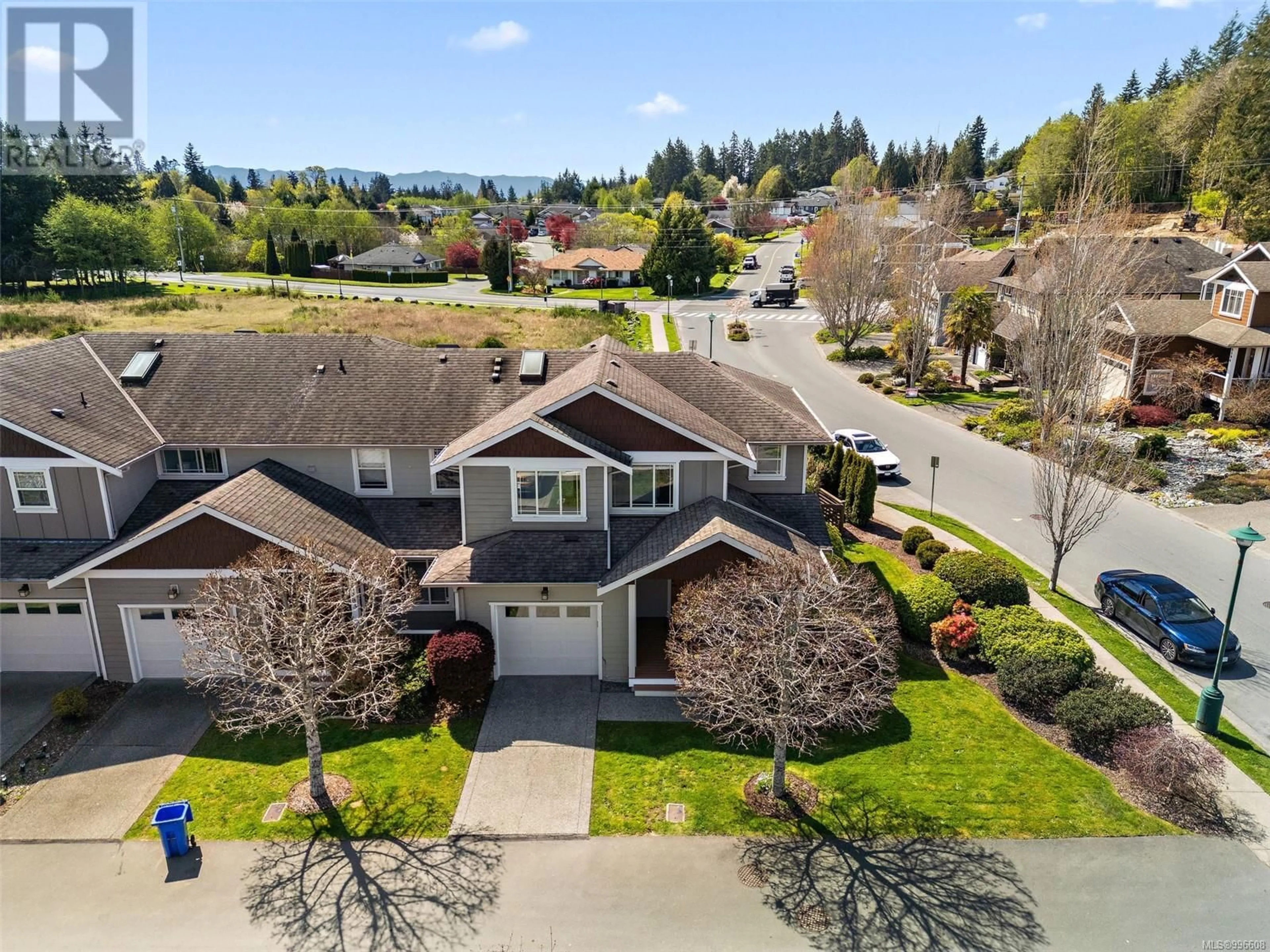 A pic from outside/outdoor area/front of a property/back of a property/a pic from drone, street for 101 - 6591 ARRANWOOD DRIVE, Sooke British Columbia V9Z0W4