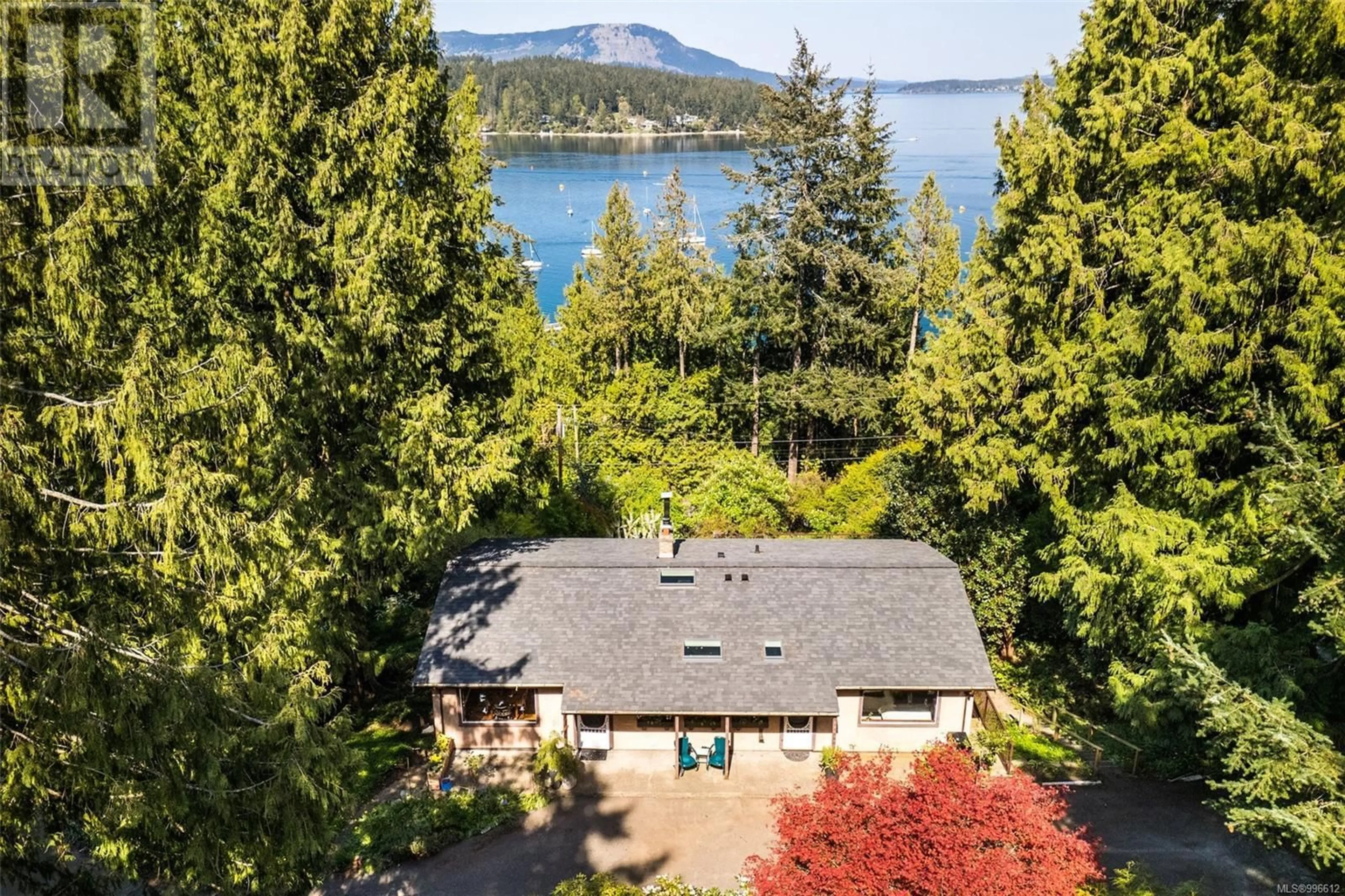 A pic from outside/outdoor area/front of a property/back of a property/a pic from drone, water/lake/river/ocean view for 2576 MILL BAY ROAD, Mill Bay British Columbia V8H1C9