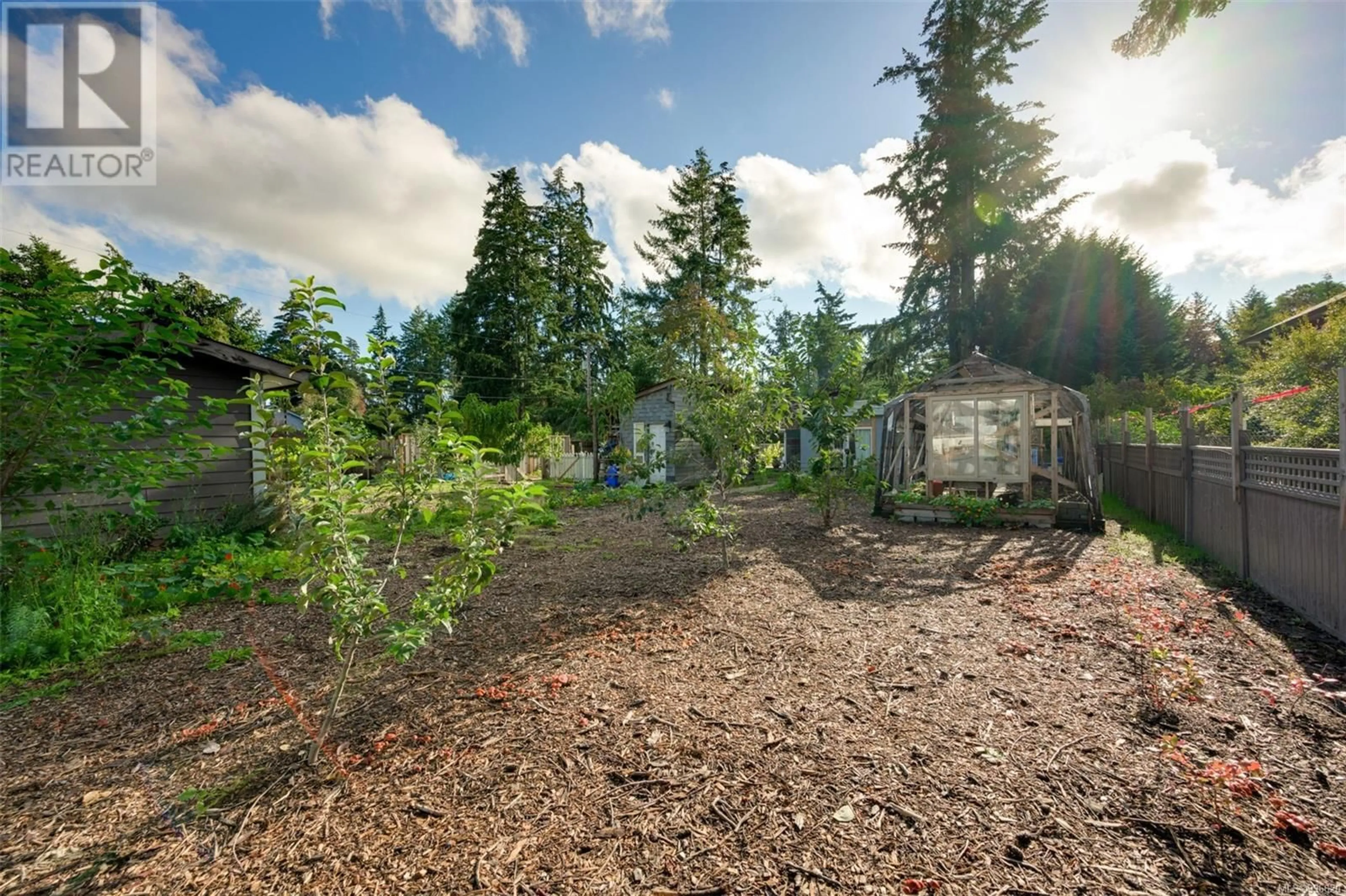 A pic from outside/outdoor area/front of a property/back of a property/a pic from drone, forest/trees view for 2329/2333 SOOKE ROAD, Colwood British Columbia V9B1X9