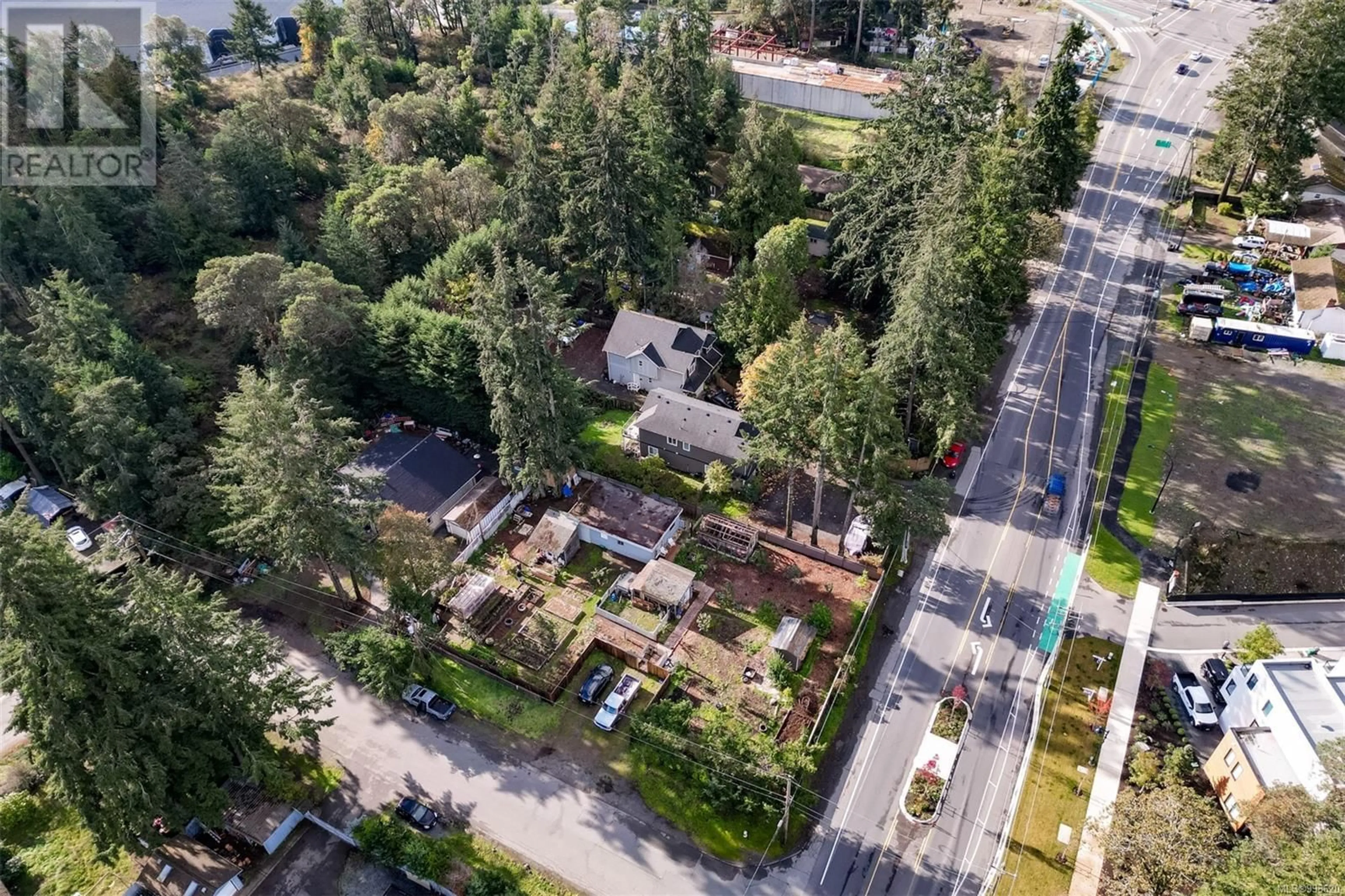A pic from outside/outdoor area/front of a property/back of a property/a pic from drone, street for 2329/2333 SOOKE ROAD, Colwood British Columbia V9B1X9