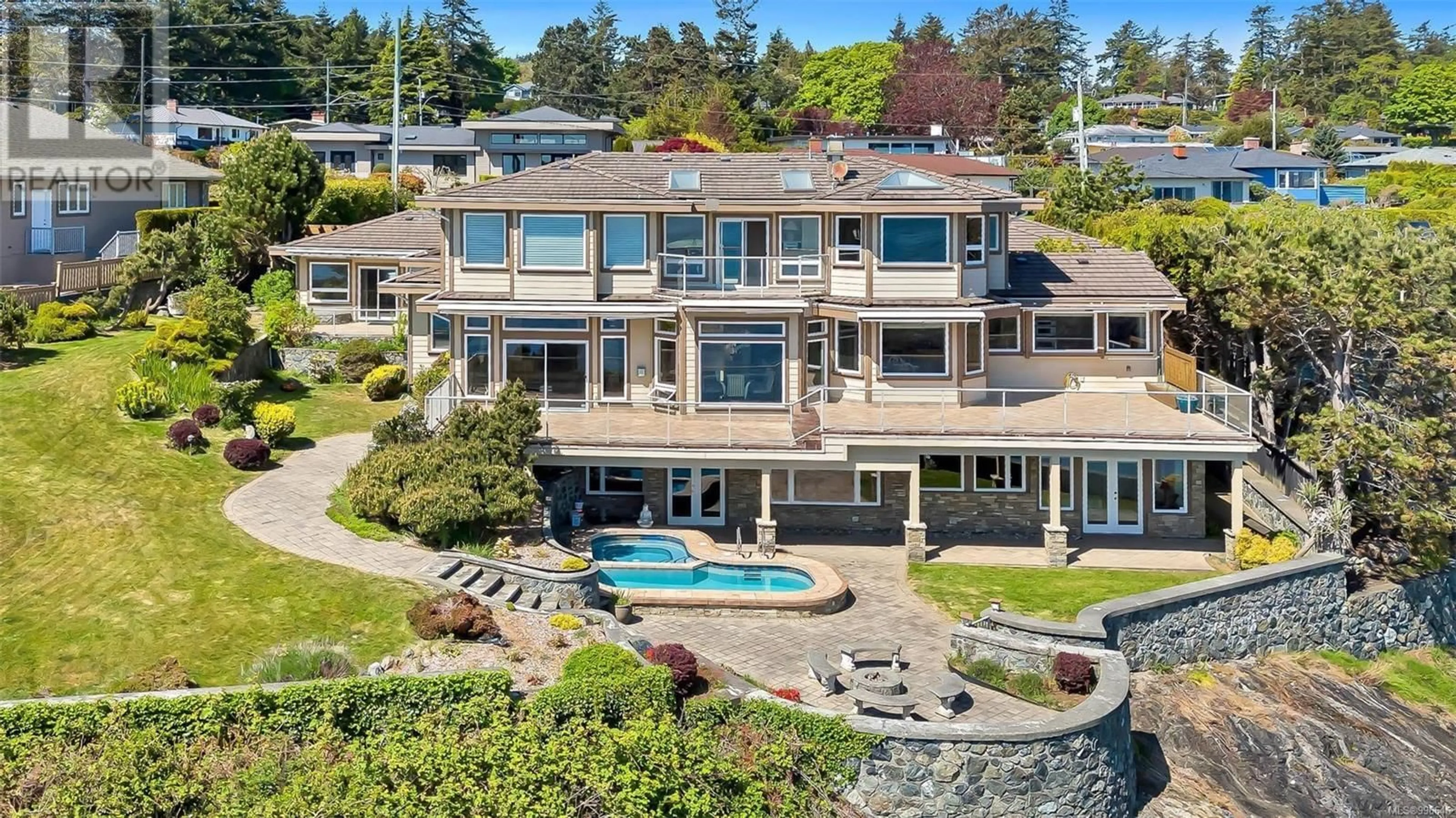 A pic from outside/outdoor area/front of a property/back of a property/a pic from drone, water/lake/river/ocean view for 4461 SHORE WAY, Saanich British Columbia V8N3V1