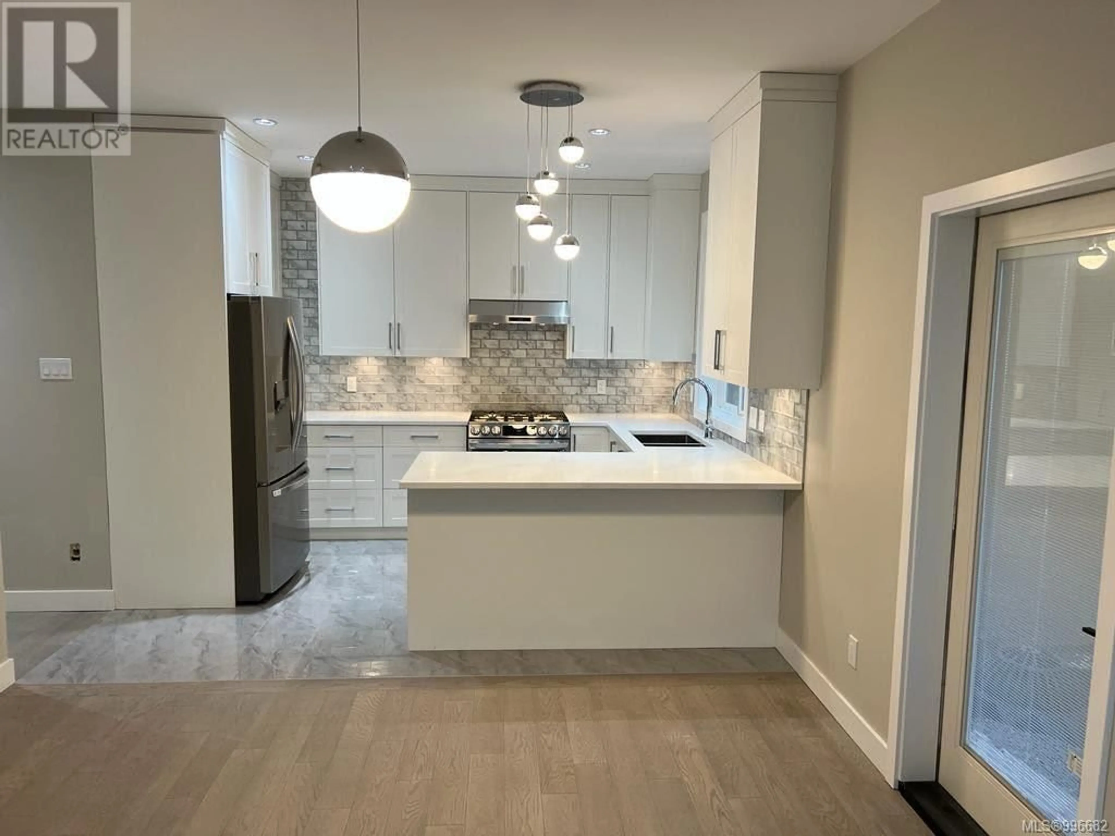 Contemporary kitchen, ceramic/tile floor for 3765 SEATON STREET, Saanich British Columbia V8Z3W1