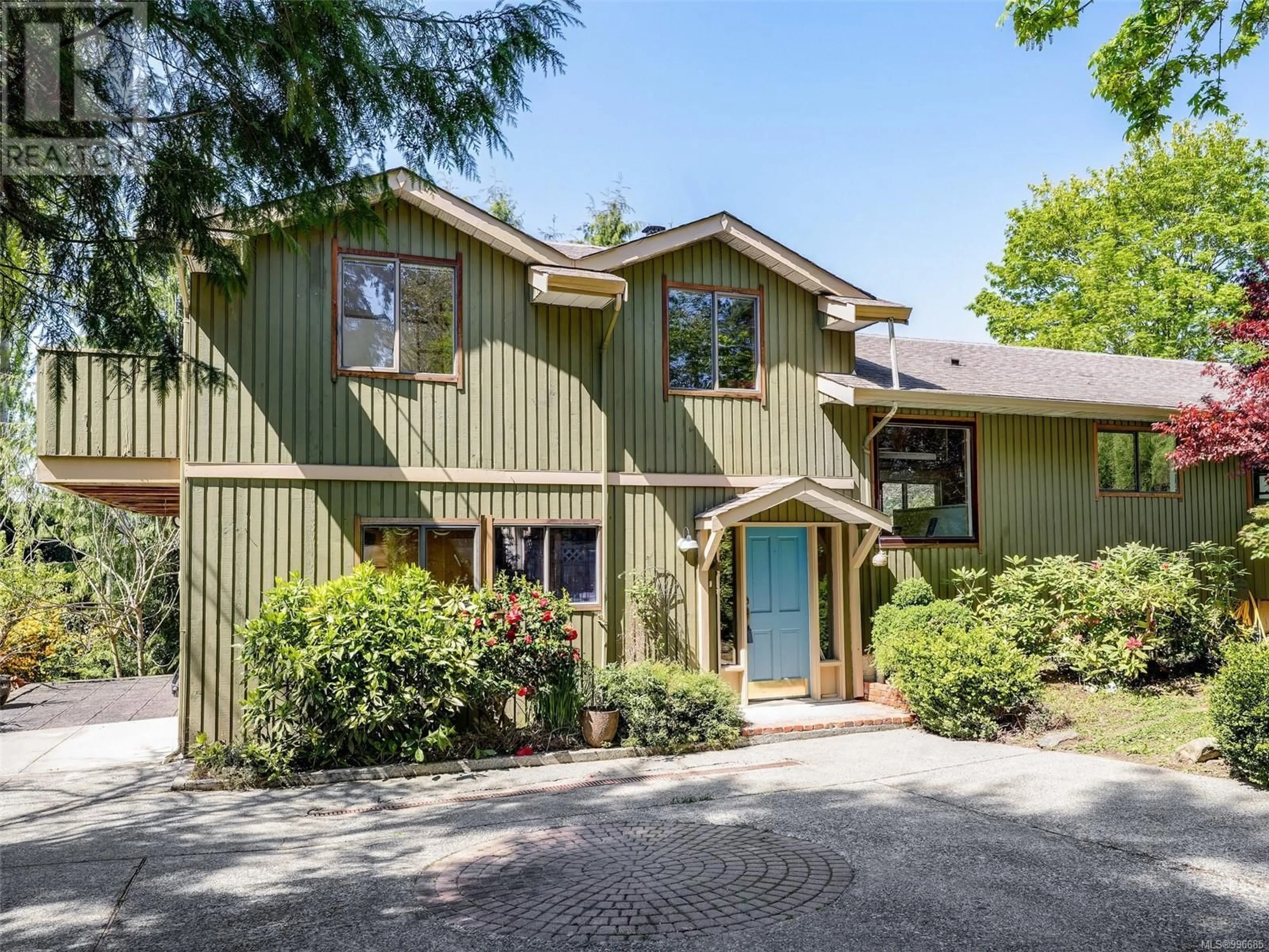 Home with vinyl exterior material, street for 7082 HAGAN ROAD, Central Saanich British Columbia V8M1E4