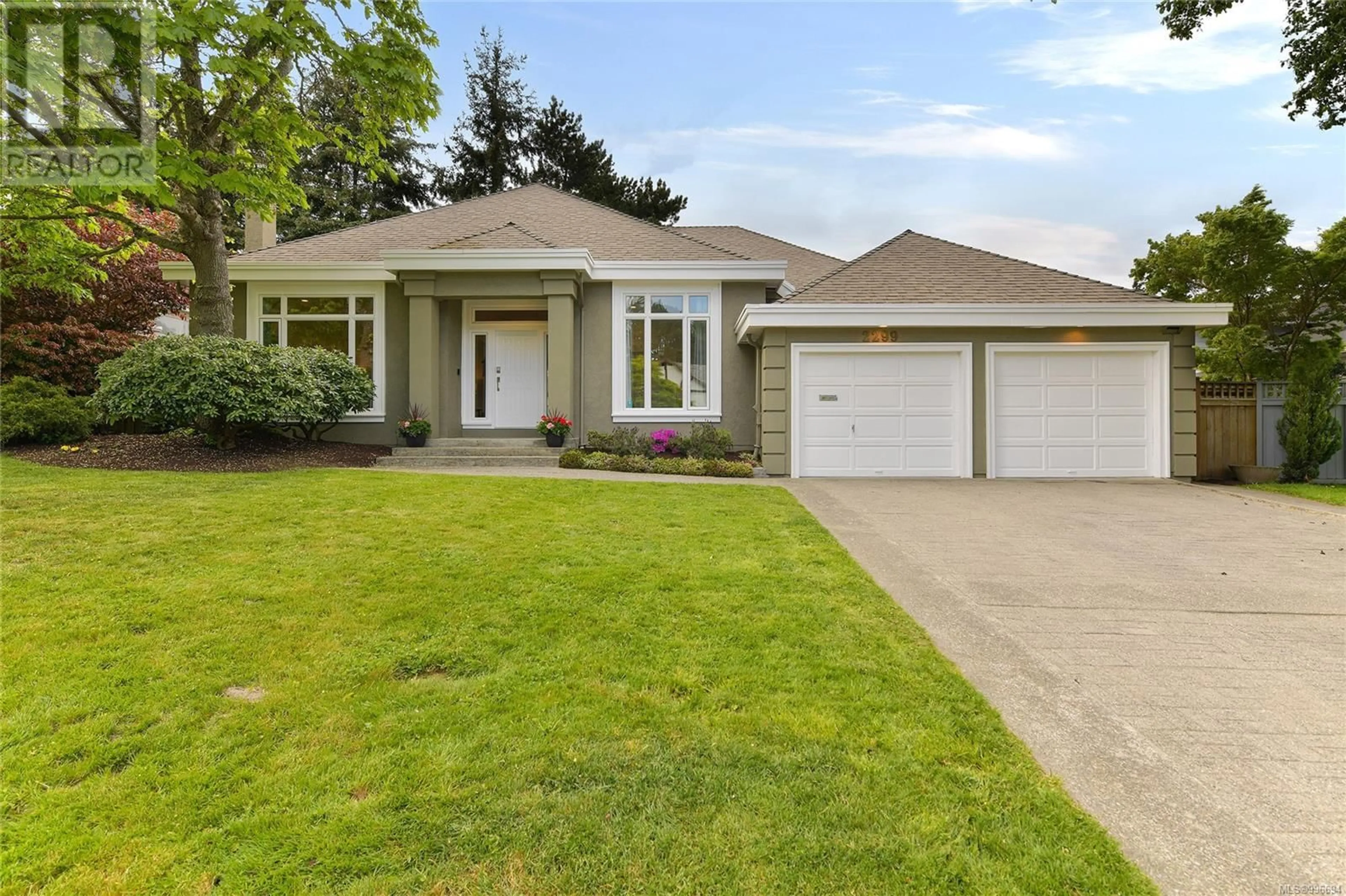 Home with vinyl exterior material, street for 2299 GREENLANDS ROAD, Saanich British Columbia V8N5B9