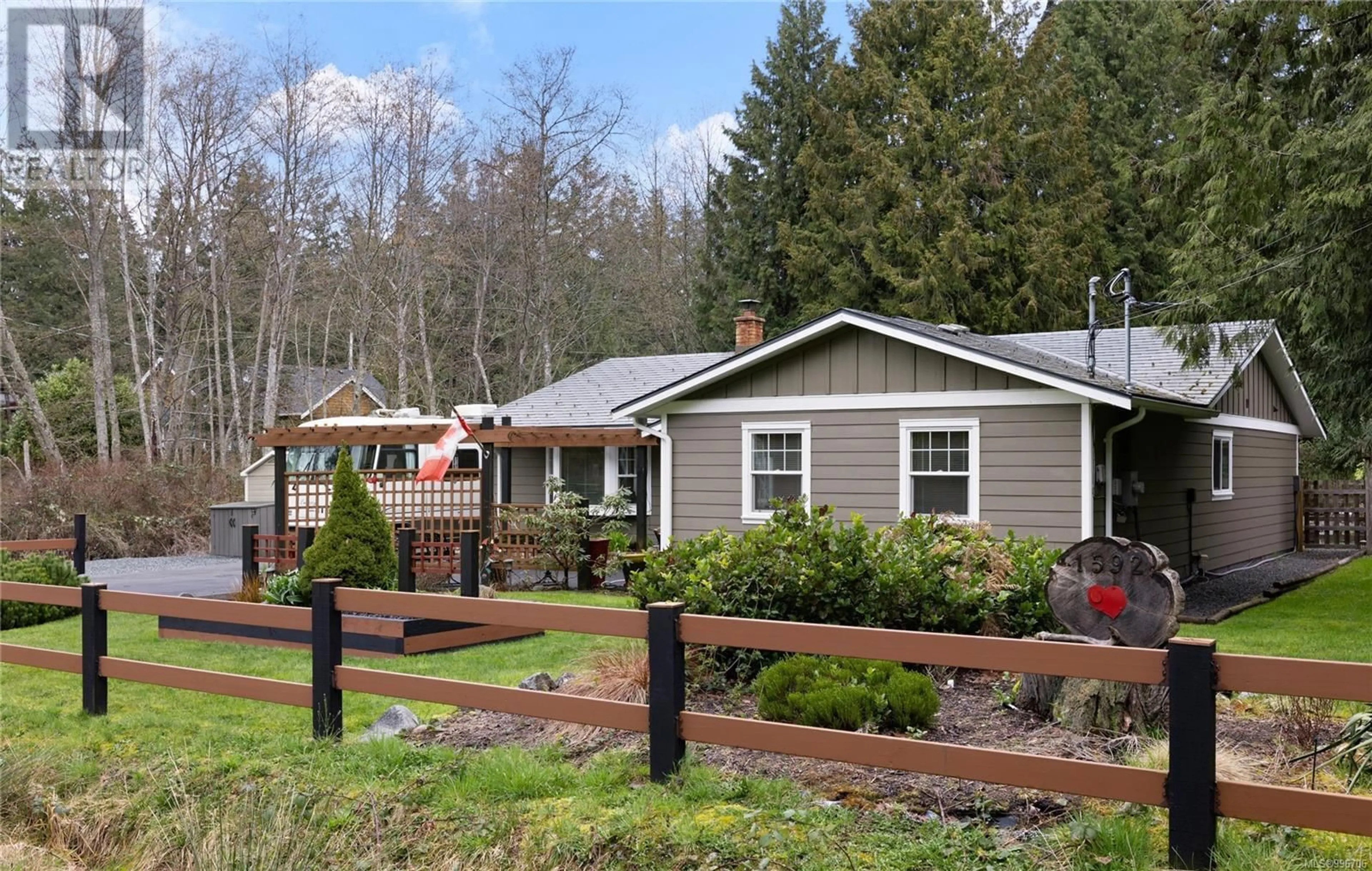 Home with vinyl exterior material, street for 1592 BEAVER CREEK WHARF ROAD, Nanoose Bay British Columbia V9P9C4