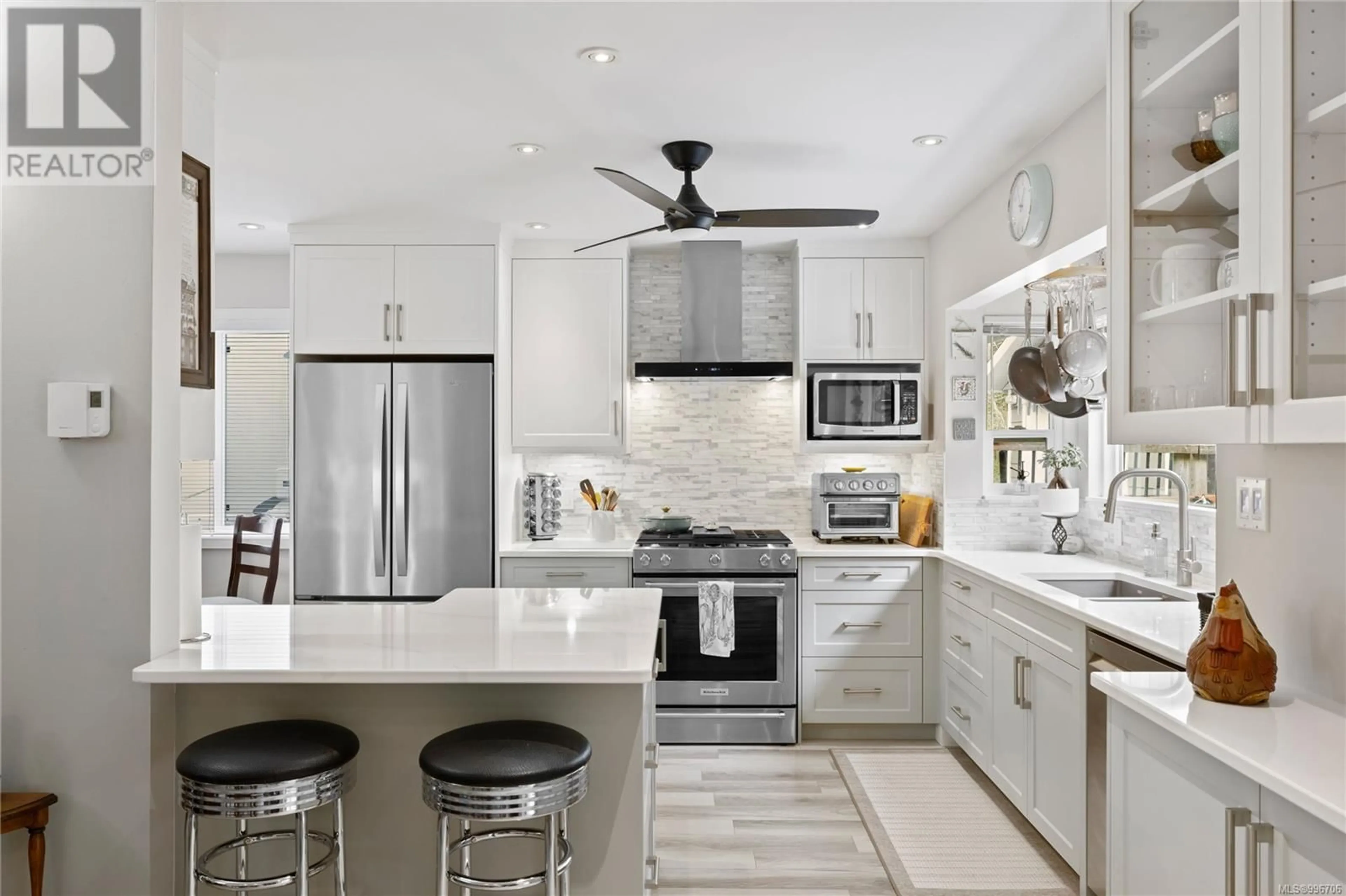Contemporary kitchen, ceramic/tile floor for 1592 BEAVER CREEK WHARF ROAD, Nanoose Bay British Columbia V9P9C4