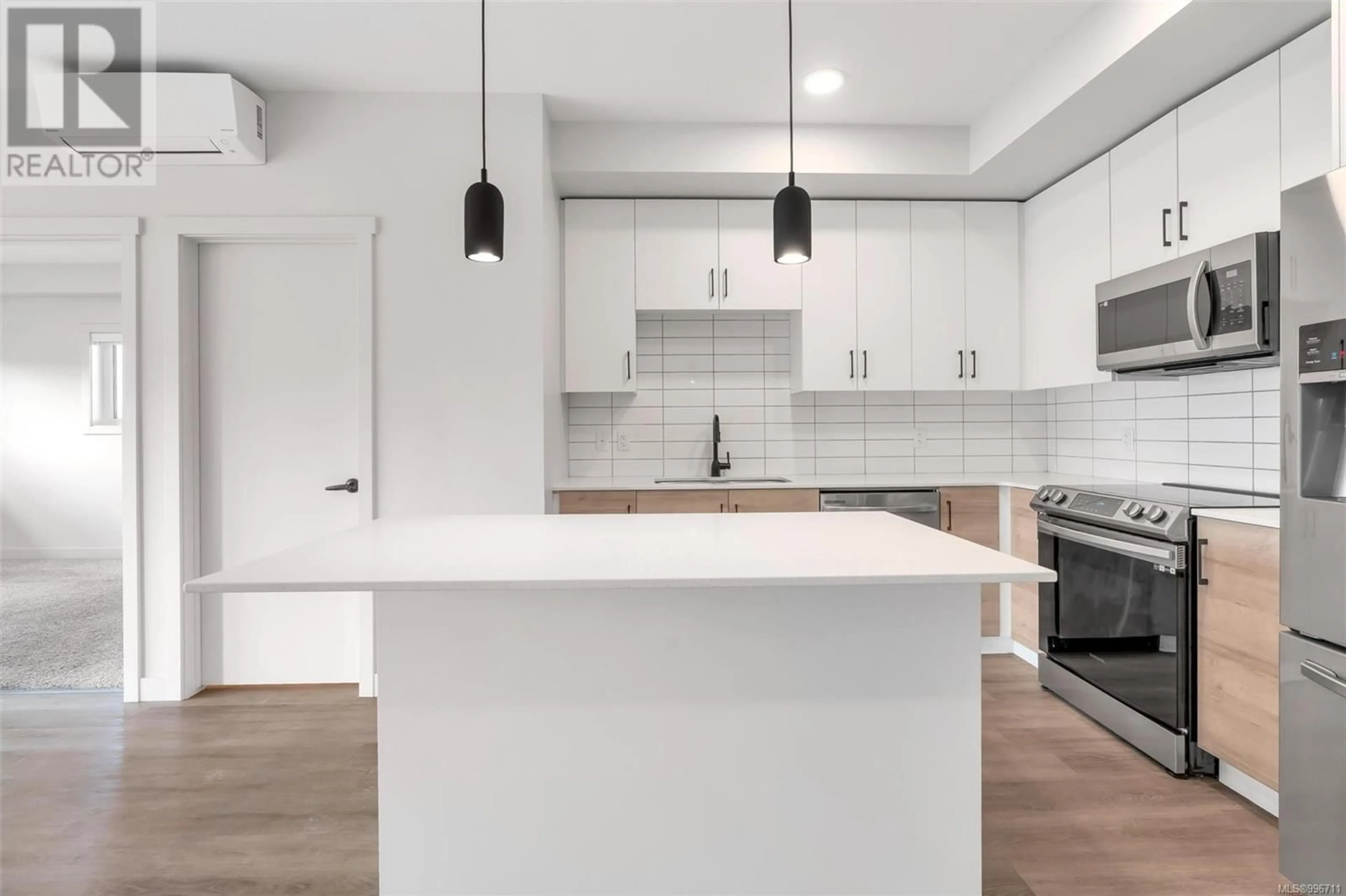Open concept kitchen, unknown for 311 - 2461 GATEWAY ROAD, Langford British Columbia V9B6M6