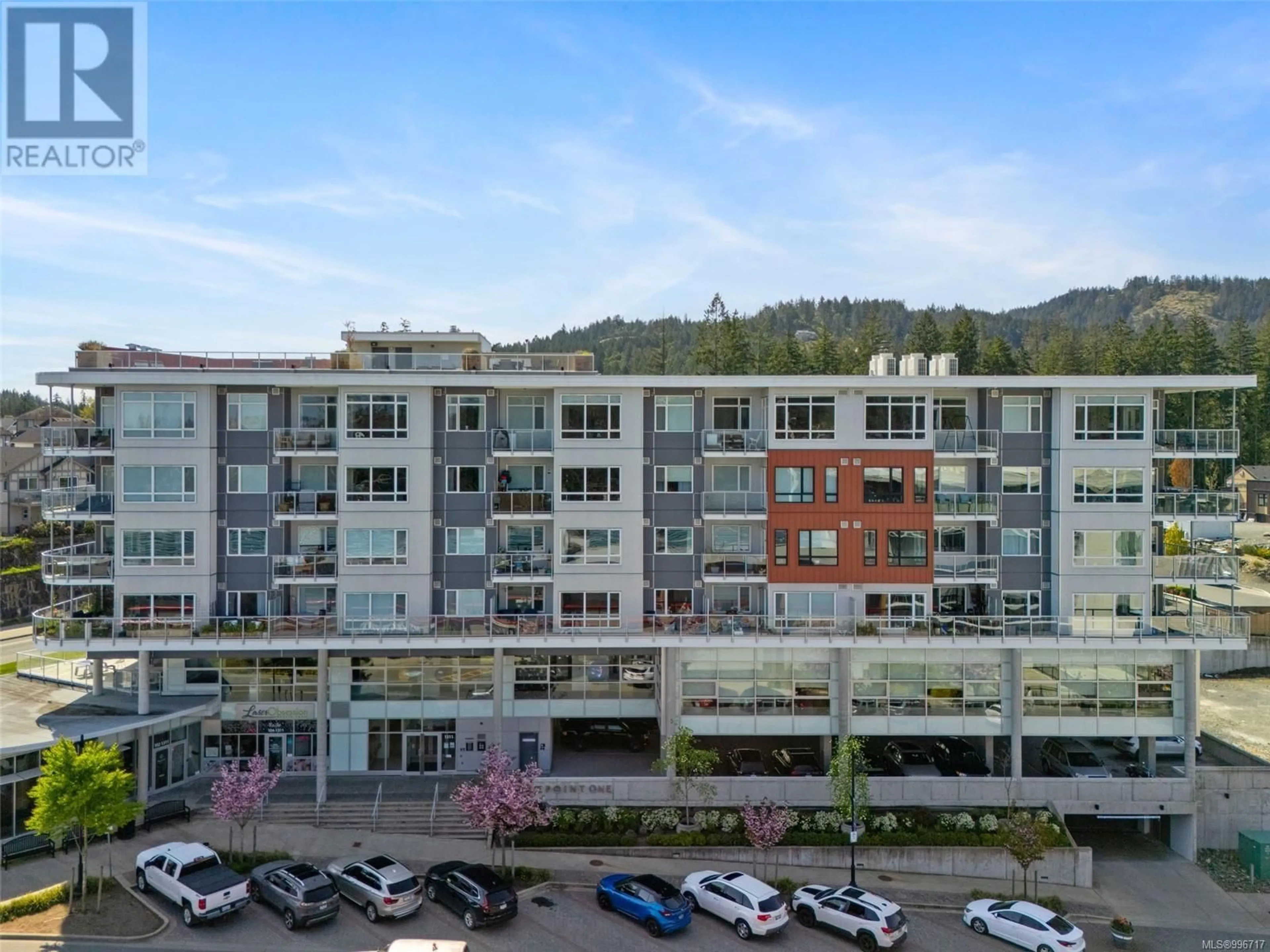 A pic from outside/outdoor area/front of a property/back of a property/a pic from drone, mountain view for 604 - 1311 LAKEPOINT WAY, Langford British Columbia V9B0S7