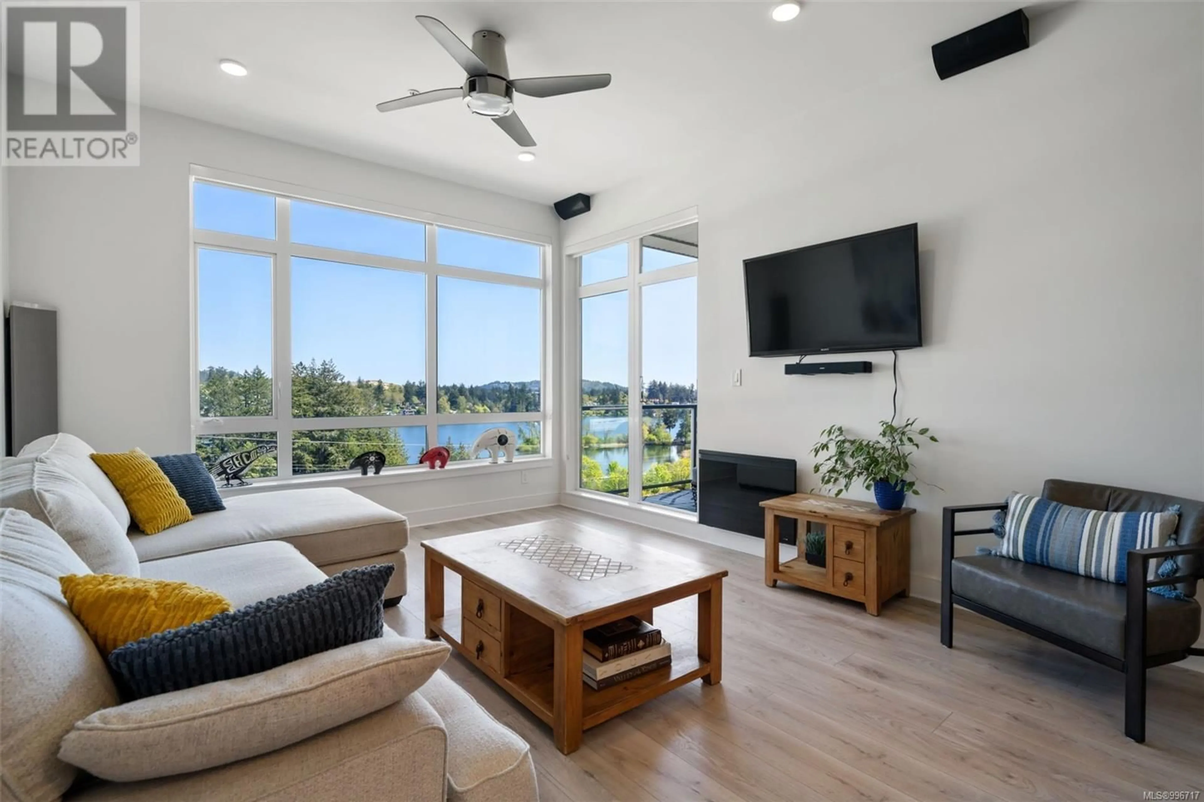Living room with furniture, unknown for 604 - 1311 LAKEPOINT WAY, Langford British Columbia V9B0S7