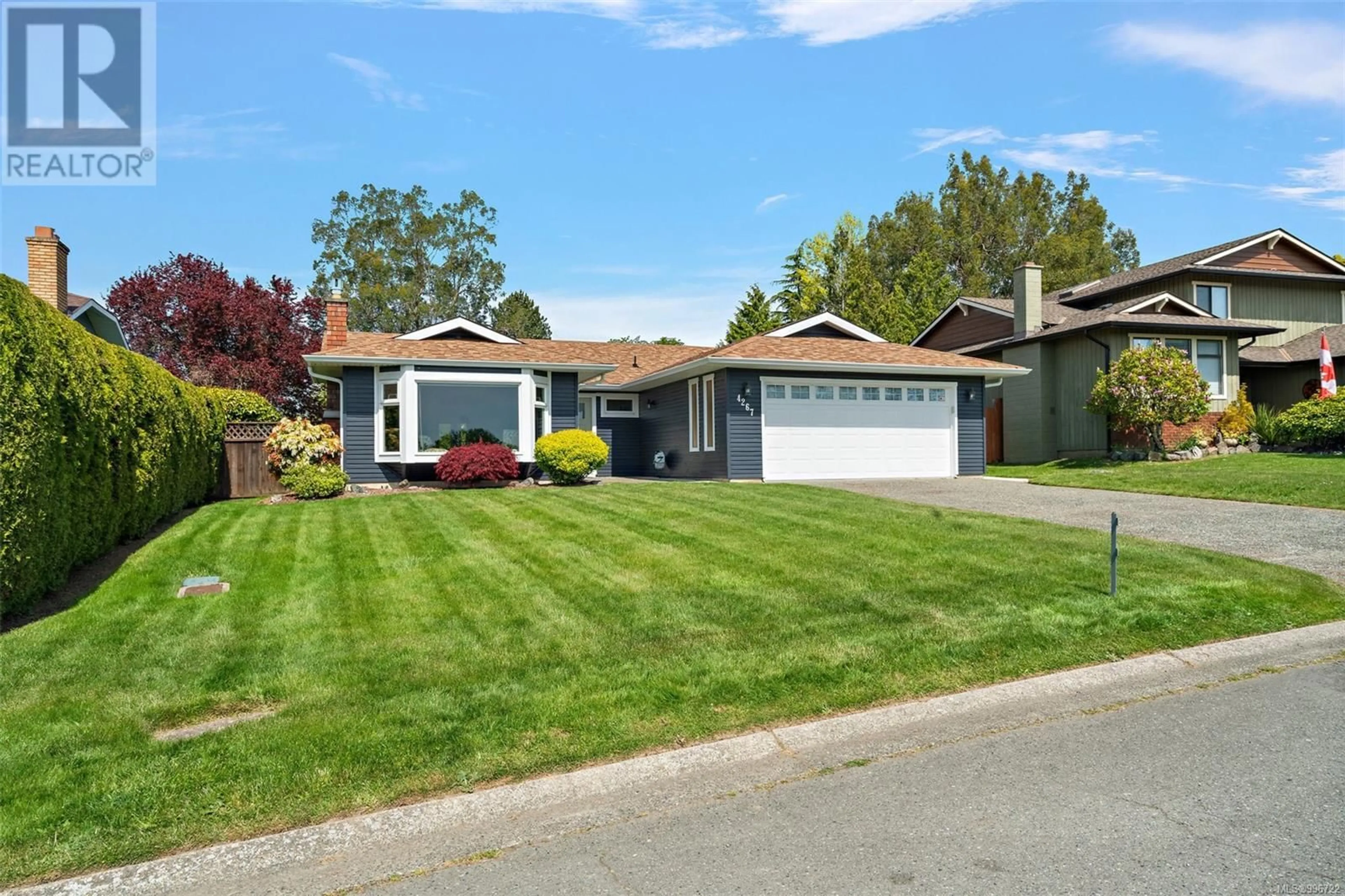Home with vinyl exterior material, street for 4267 PANORAMA DRIVE, Saanich British Columbia V8X4X9