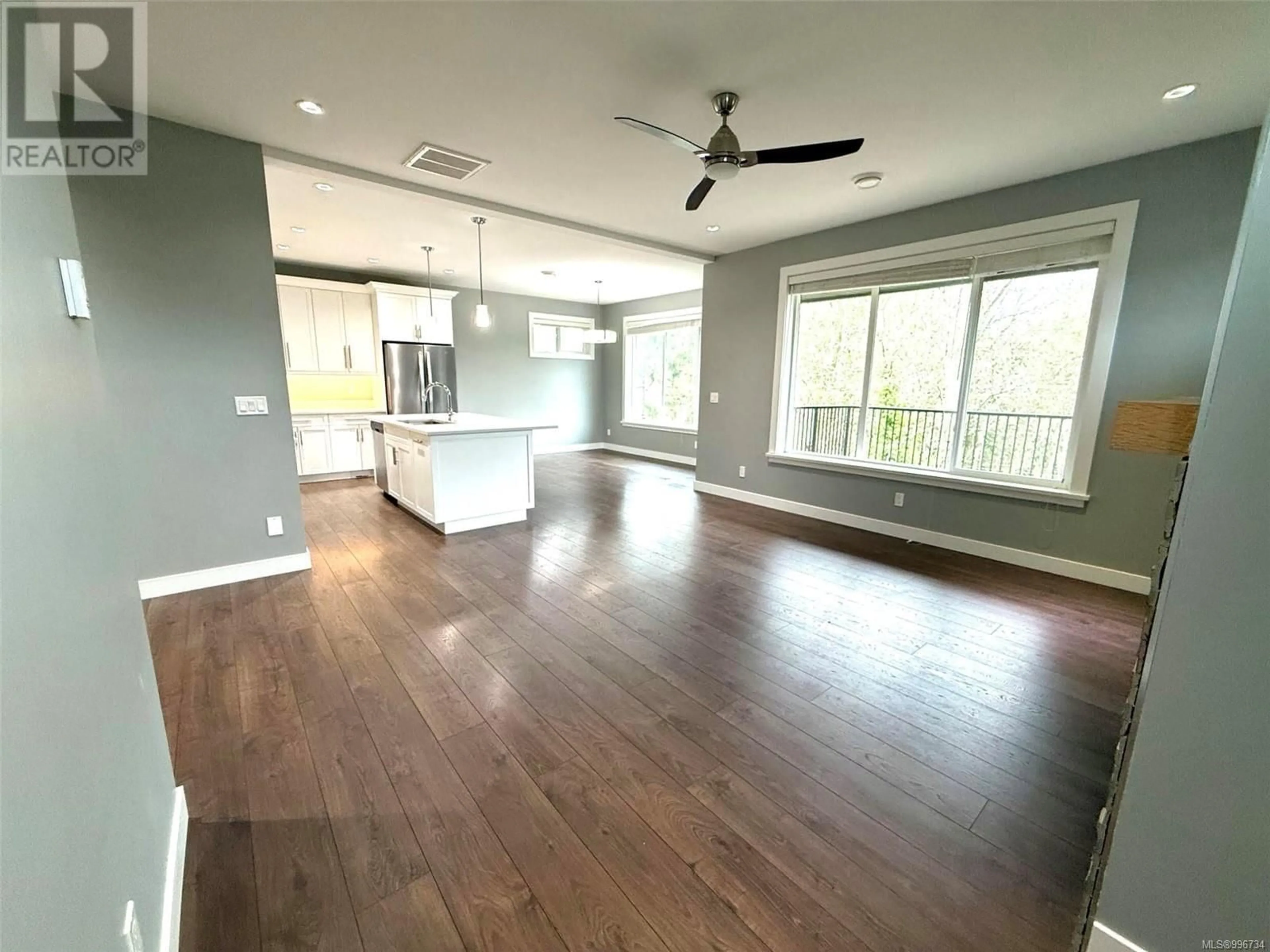 Open concept kitchen, wood/laminate floor for 3624 URBAN RISE, Langford British Columbia V9C0N8