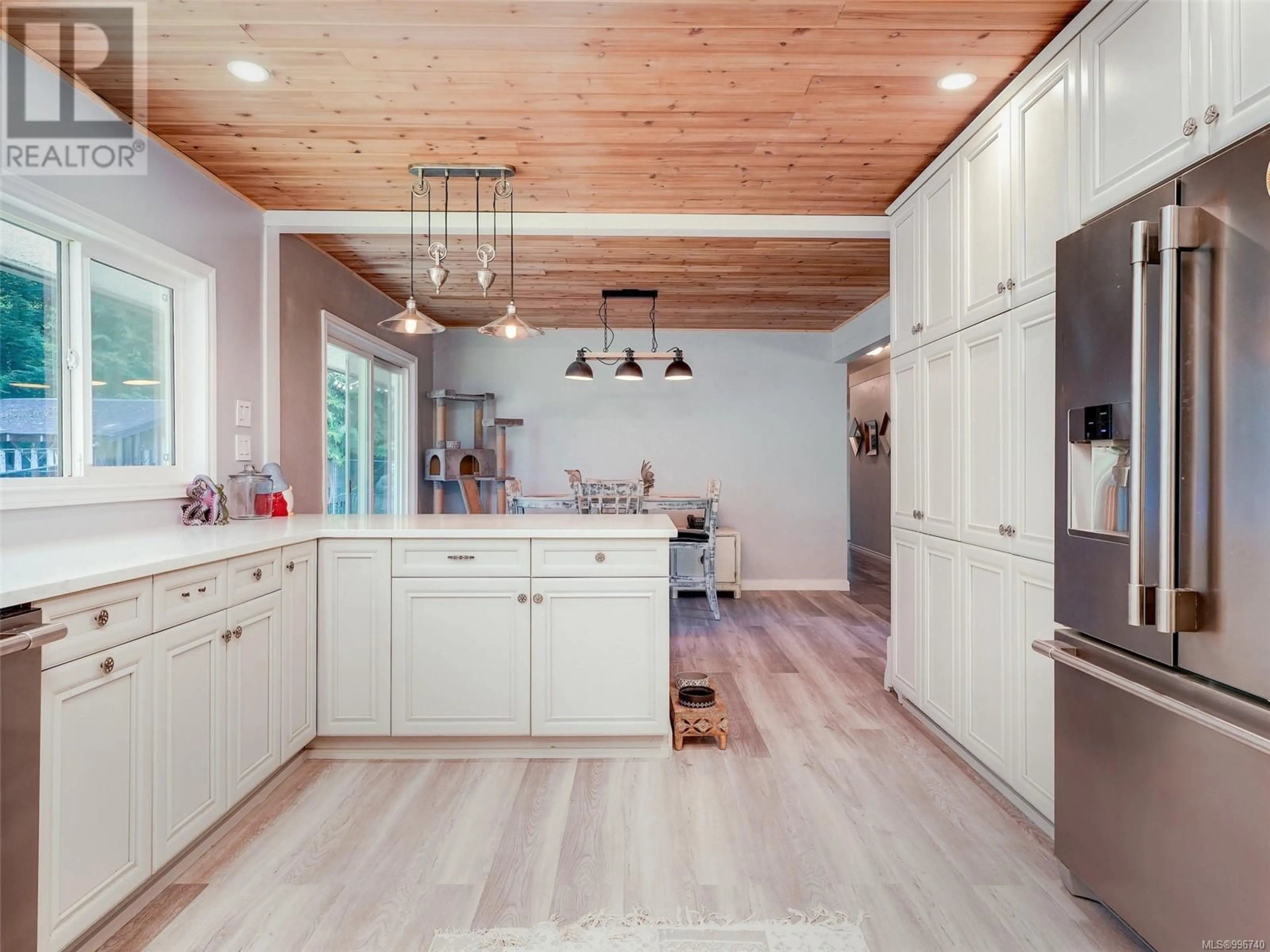 Open concept kitchen, wood/laminate floor for 2805 WOODHAVEN ROAD, Sooke British Columbia V9Z1G6