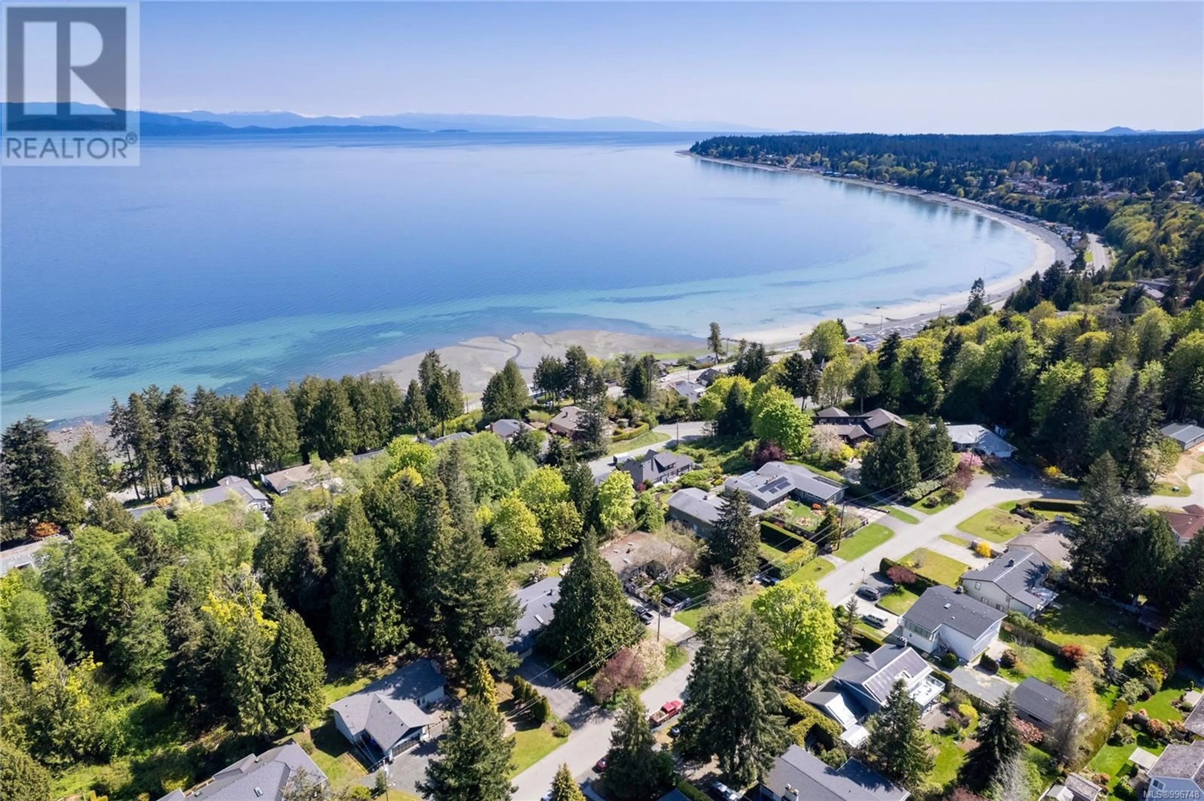 A pic from outside/outdoor area/front of a property/back of a property/a pic from drone, water/lake/river/ocean view for 651 BELYEA ROAD, Qualicum Beach British Columbia V9K1H4