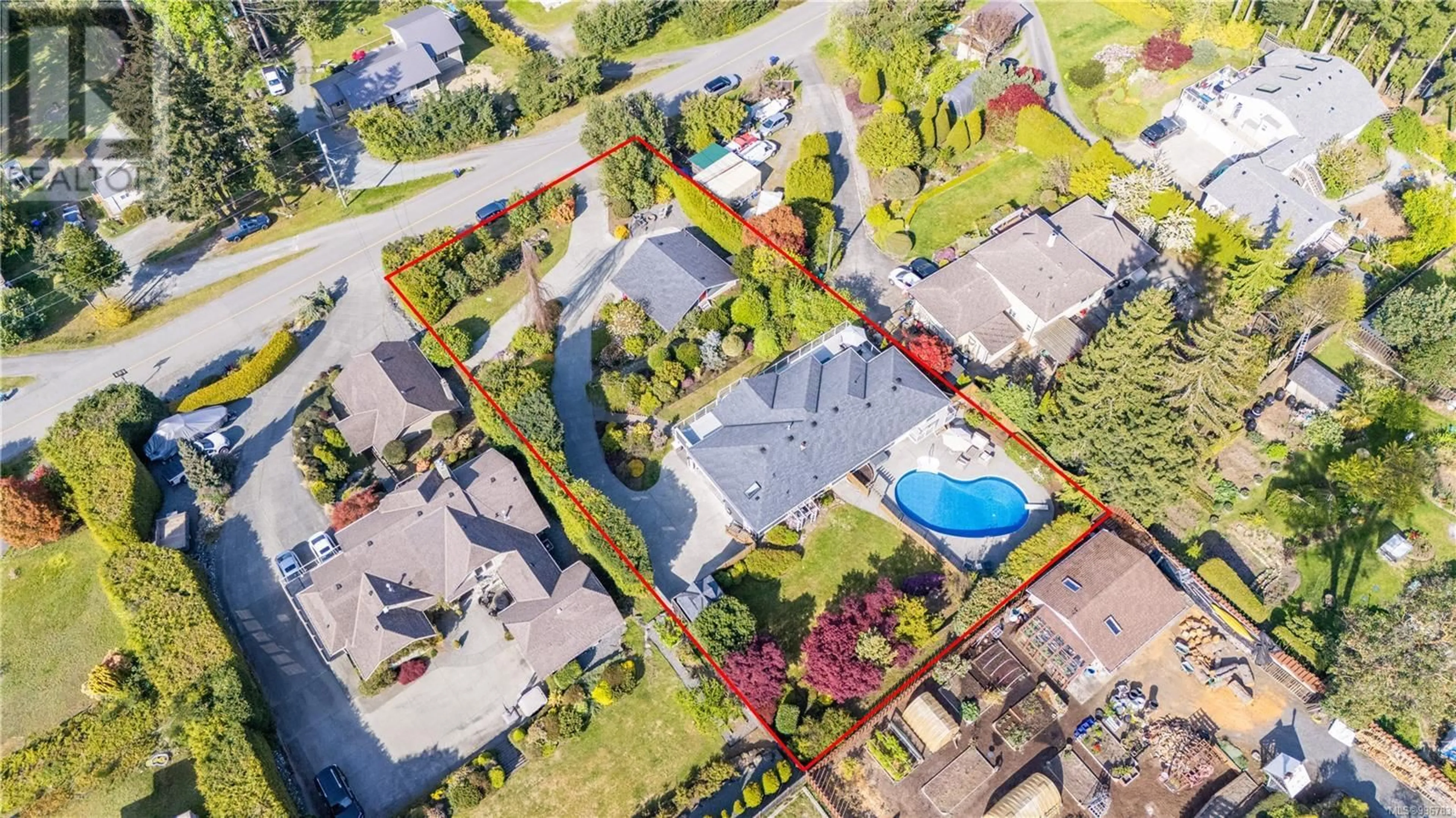 A pic from outside/outdoor area/front of a property/back of a property/a pic from drone, street for 8077 NORTHWIND DRIVE, Lantzville British Columbia V0R2H0