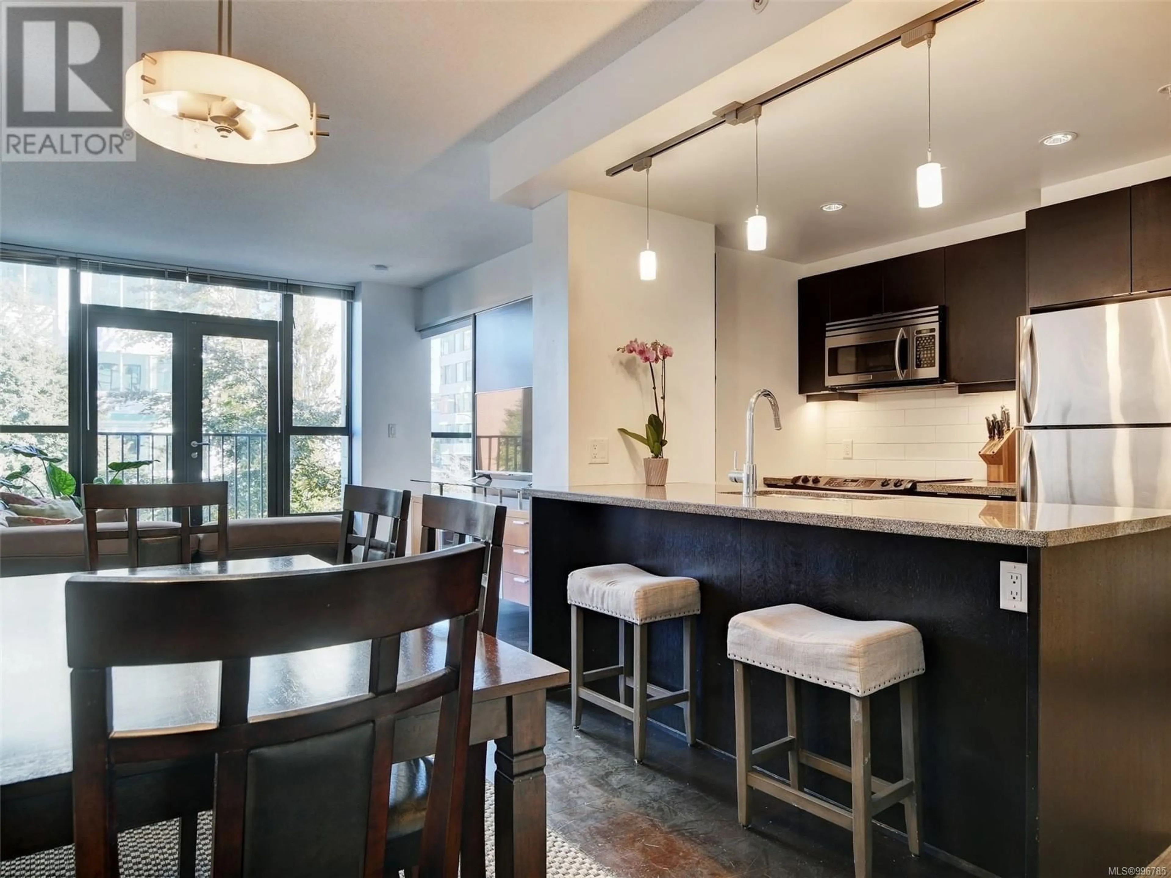 Open concept kitchen, ceramic/tile floor for 212 - 760 JOHNSON STREET, Victoria British Columbia V8W0A4