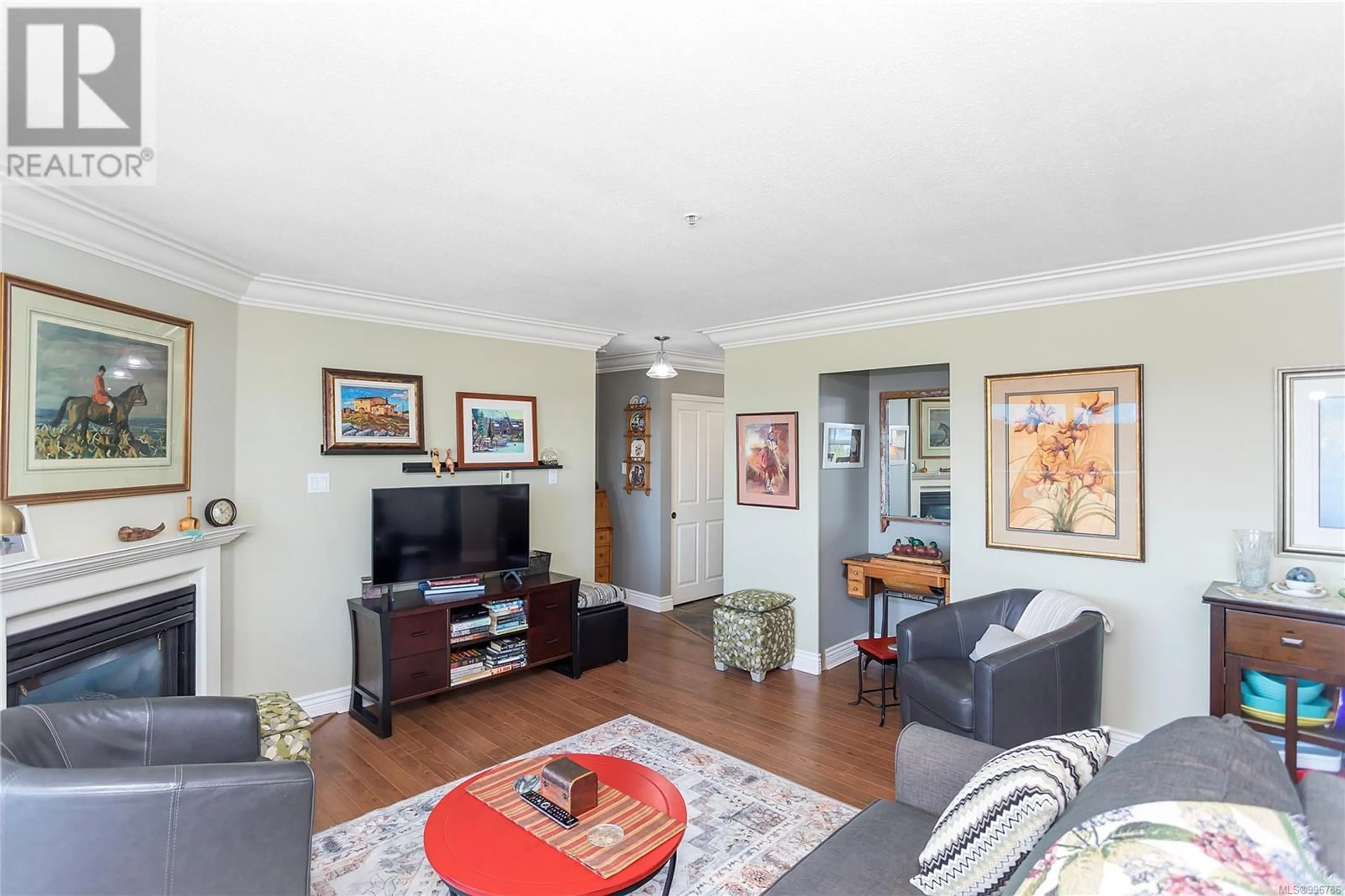 Living room with furniture, wood/laminate floor for 401 - 1685 ESTEVAN ROAD, Nanaimo British Columbia V9S5V9