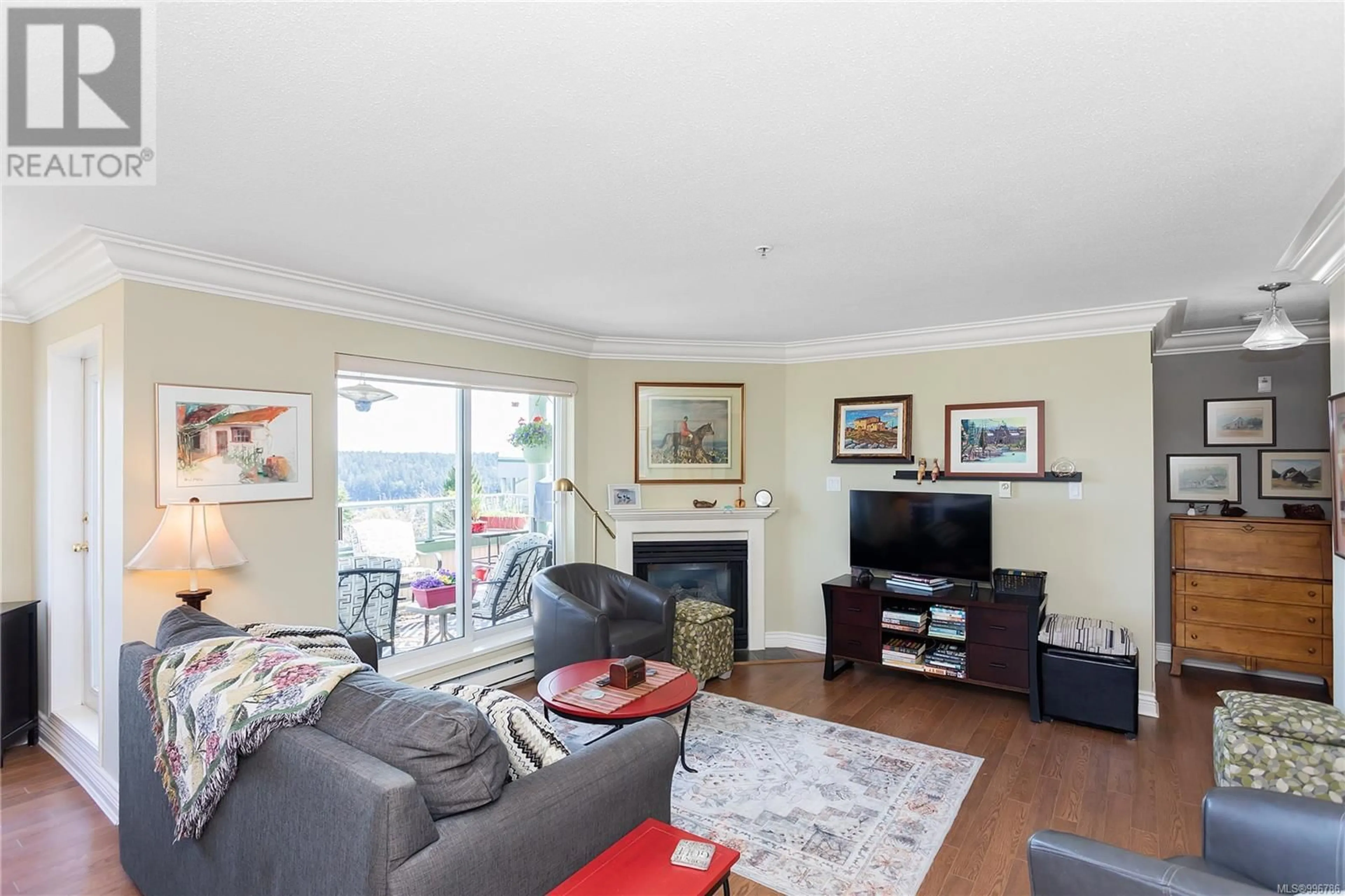 Living room with furniture, wood/laminate floor for 401 - 1685 ESTEVAN ROAD, Nanaimo British Columbia V9S5V9