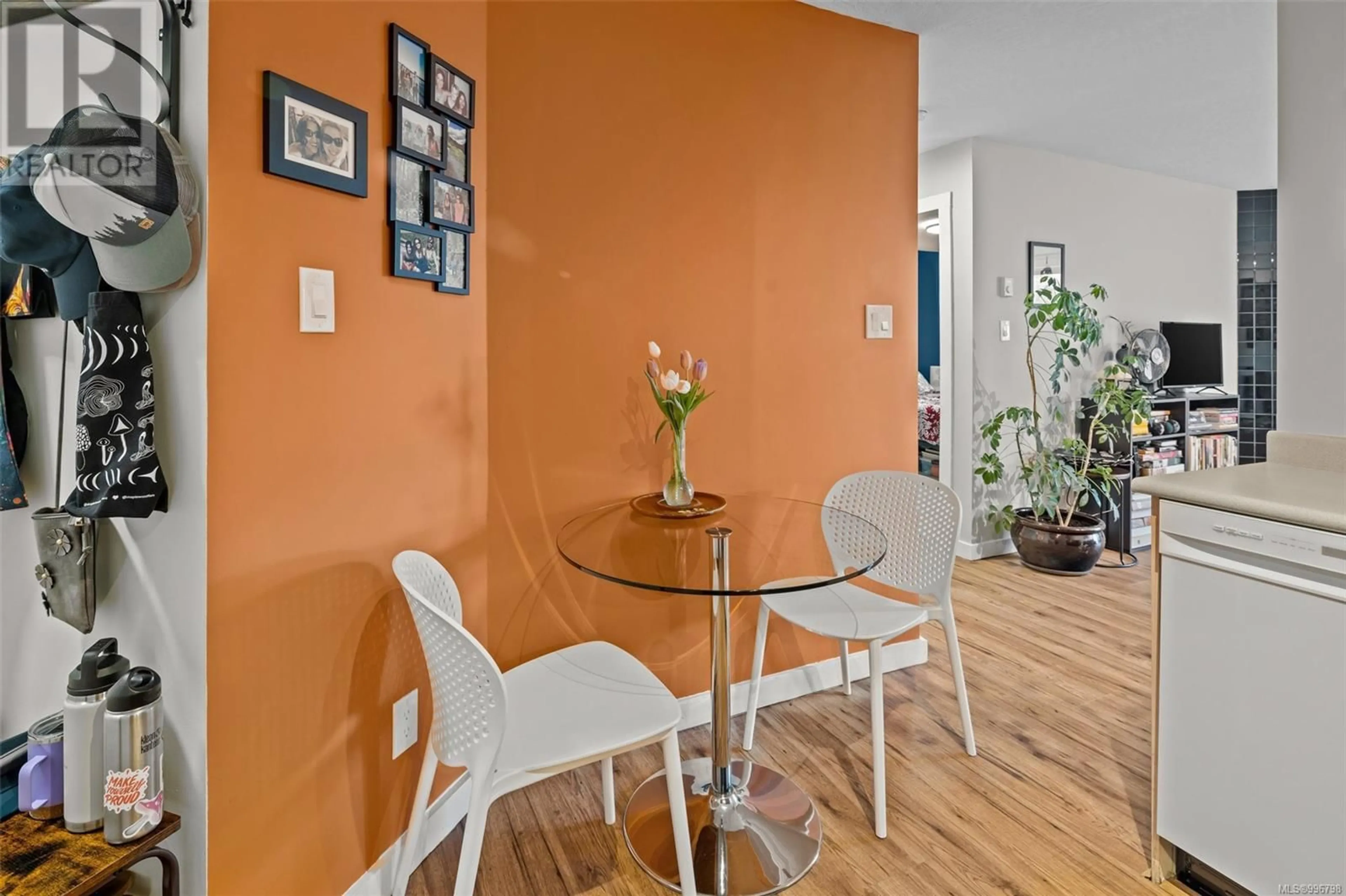 Dining room, wood/laminate floor for 201 - 930 NORTH PARK STREET, Victoria British Columbia V8T1C6
