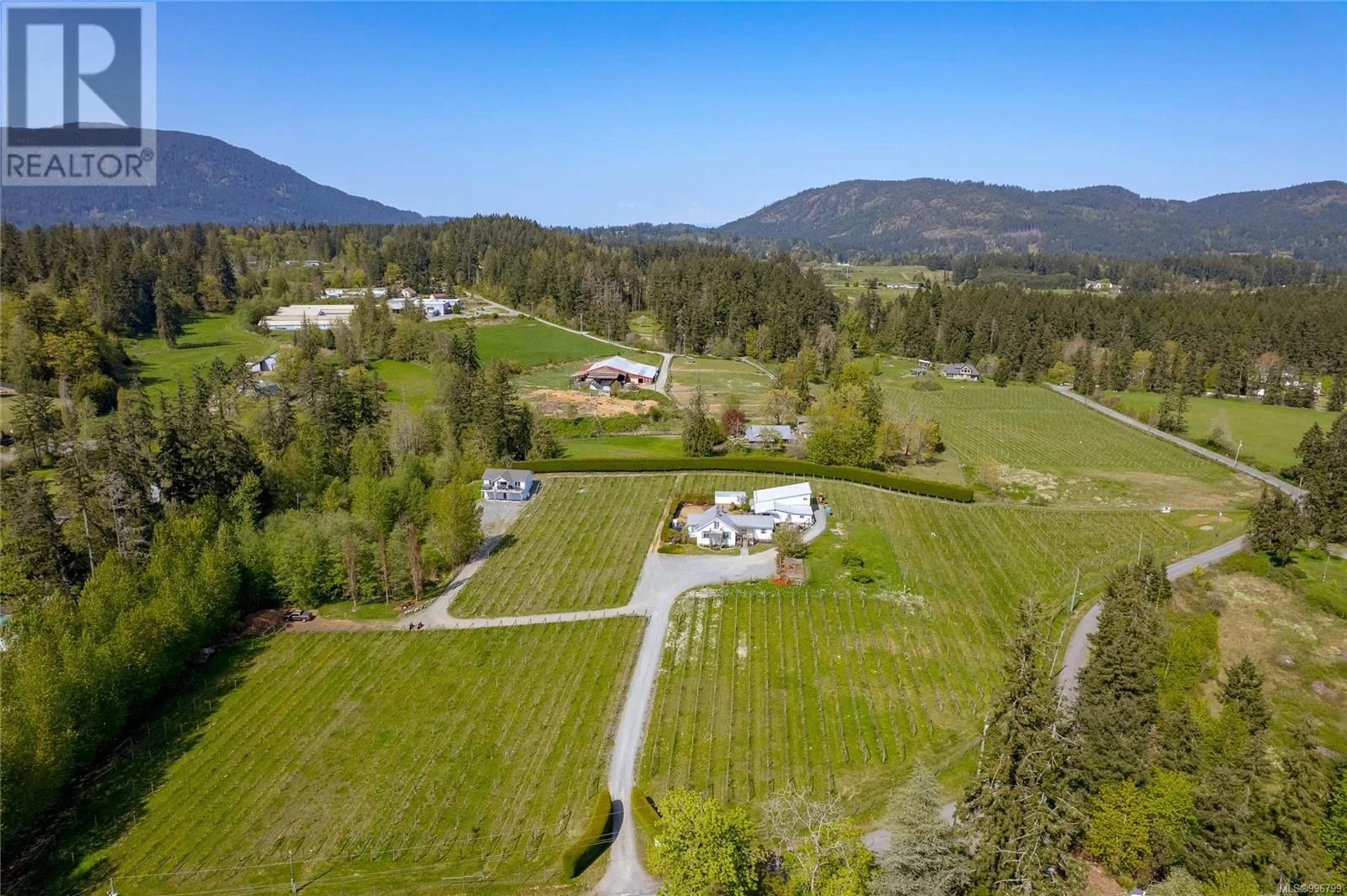 A pic from outside/outdoor area/front of a property/back of a property/a pic from drone, mountain view for 6798 NORCROSS ROAD, Duncan British Columbia V9L6C3