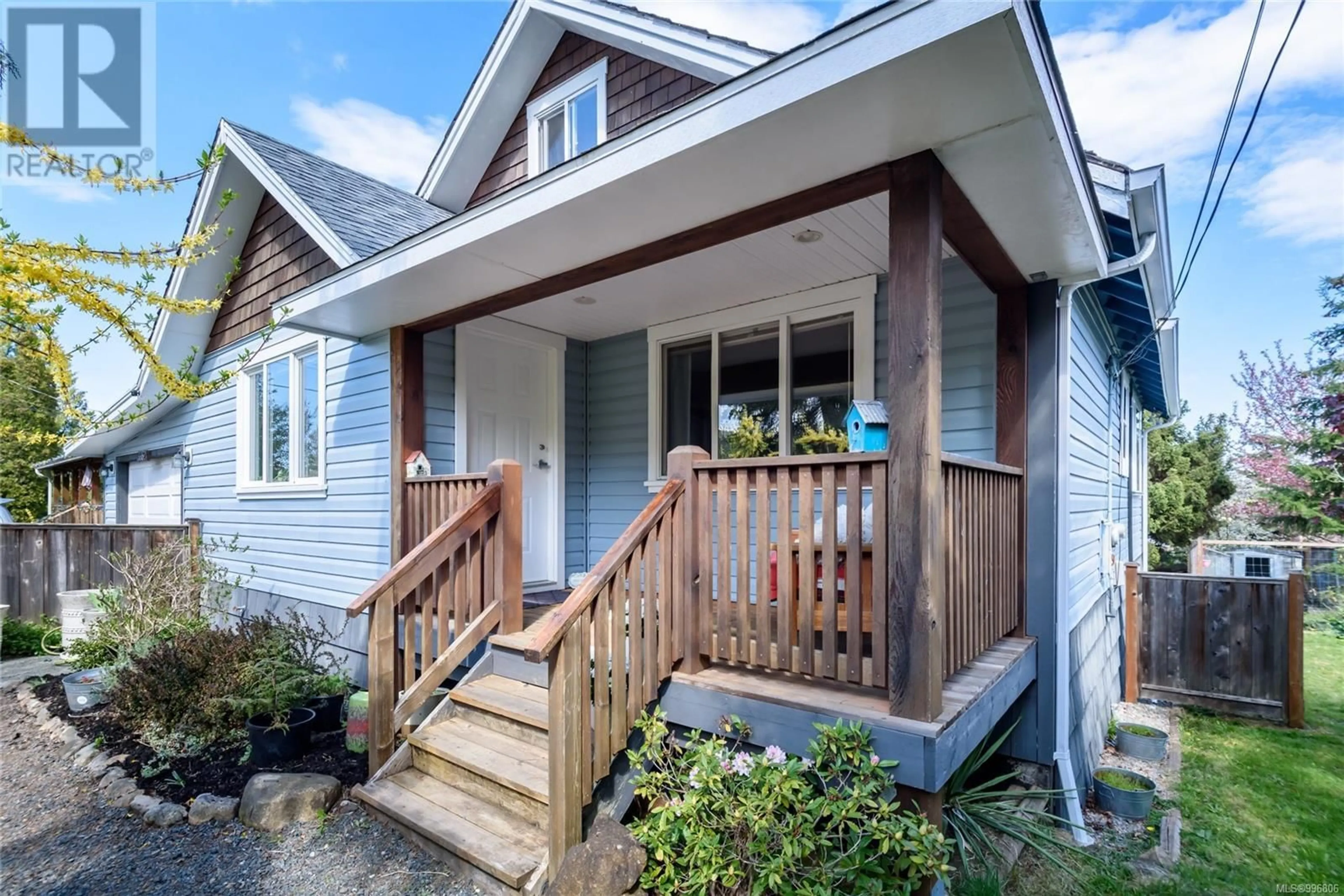 Home with vinyl exterior material, street for 3352 SECOND STREET, Cumberland British Columbia V0R1S0