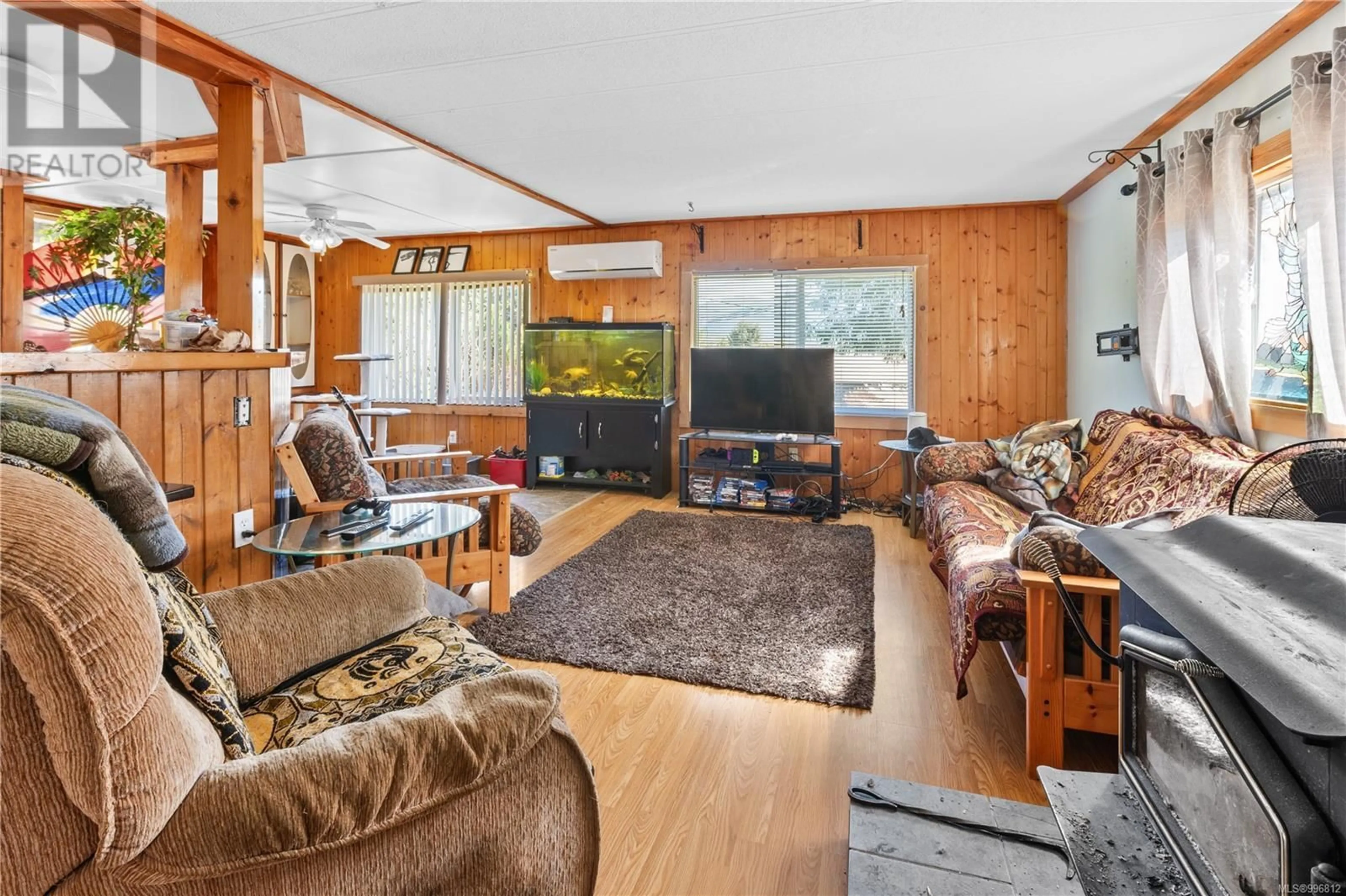 Living room with furniture, wood/laminate floor for 288 ALBION CRESCENT, Ucluelet British Columbia V0R3A0