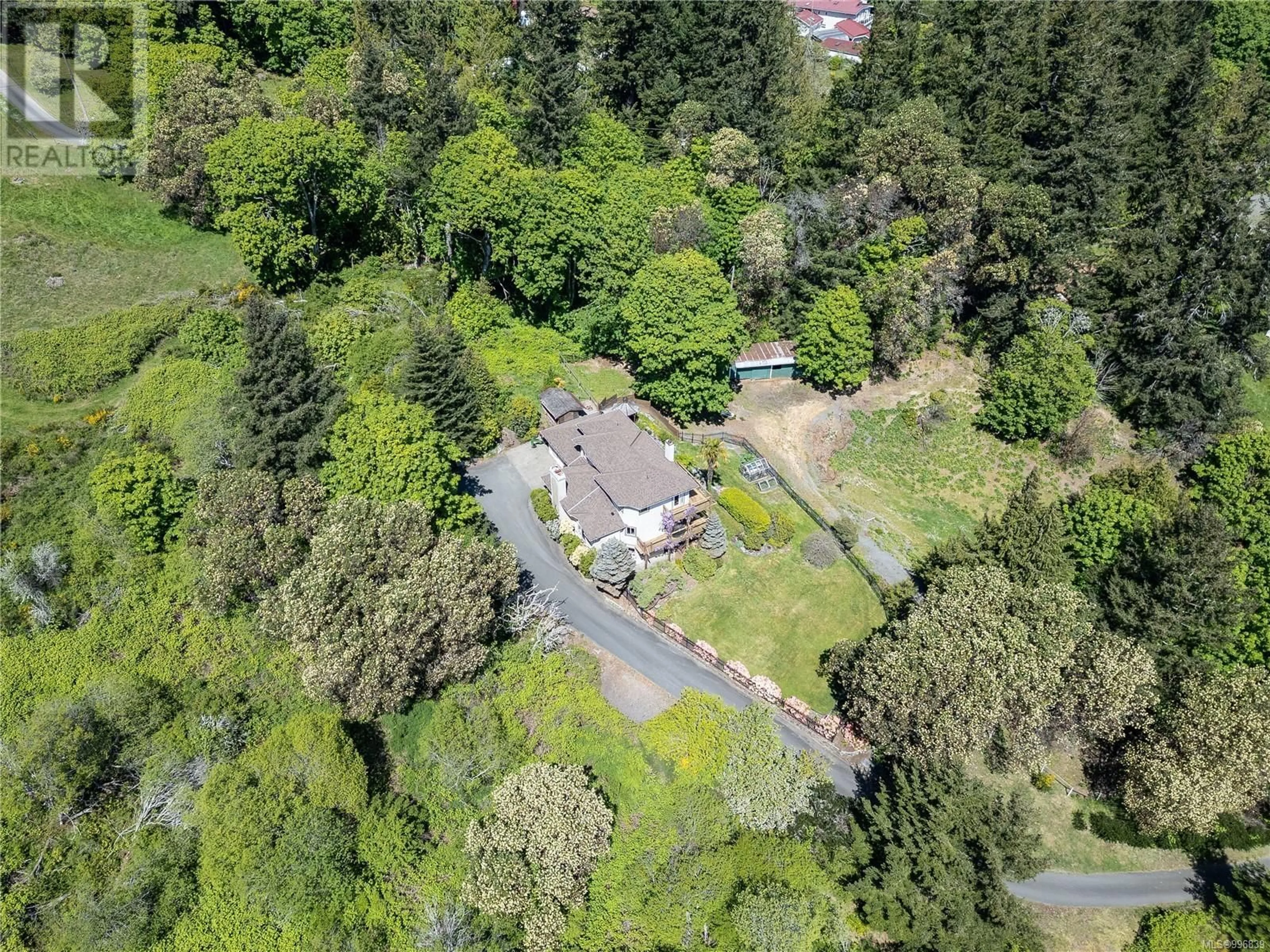 A pic from outside/outdoor area/front of a property/back of a property/a pic from drone, forest/trees view for 4910 ROCKY POINT ROAD, Metchosin British Columbia V9C4G4