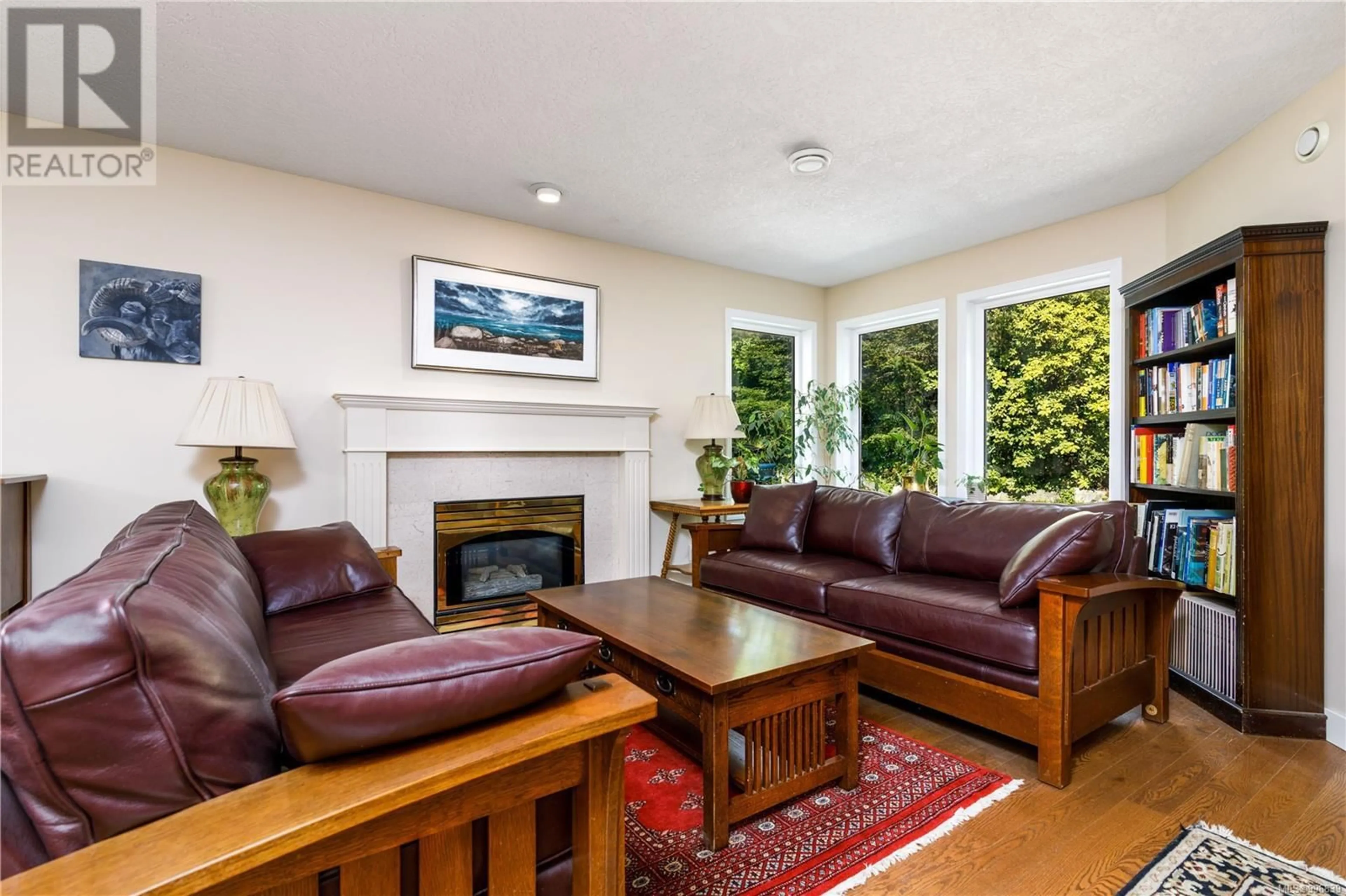 Living room with furniture, wood/laminate floor for 4910 ROCKY POINT ROAD, Metchosin British Columbia V9C4G4