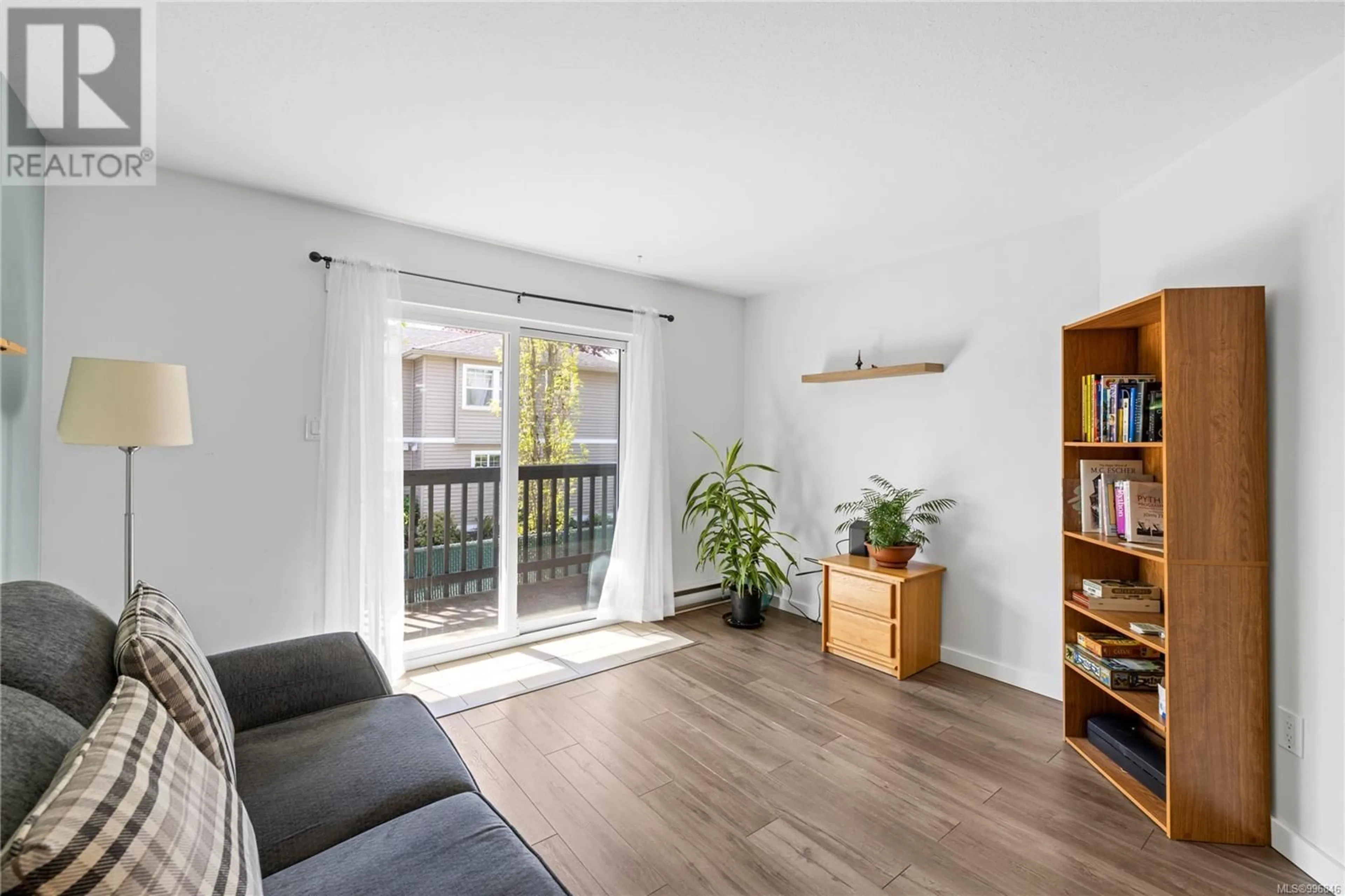 Living room with furniture, wood/laminate floor for 215 - 1540 PIERCY AVENUE, Courtenay British Columbia V9N3E9