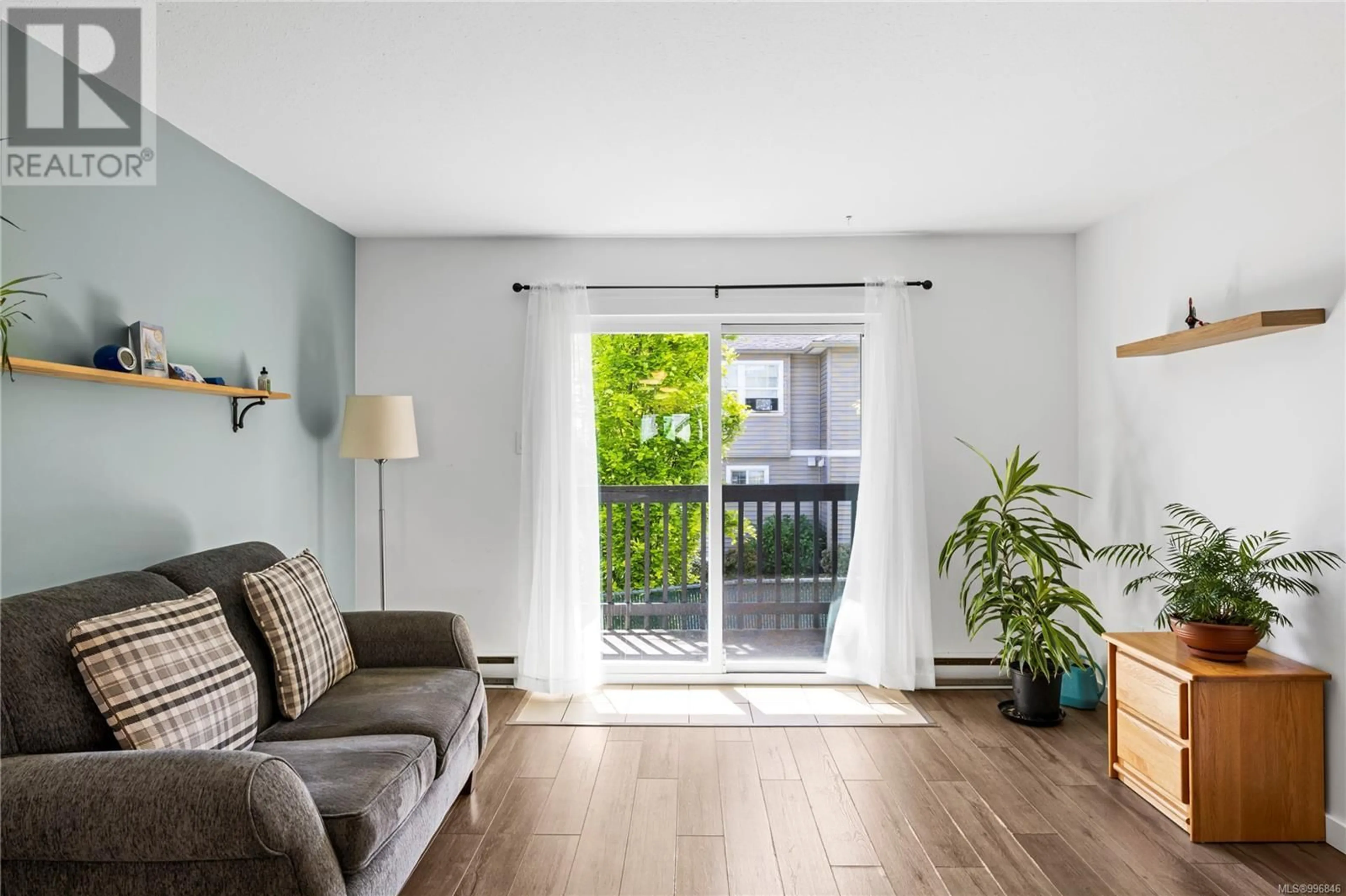 Living room with furniture, wood/laminate floor for 215 - 1540 PIERCY AVENUE, Courtenay British Columbia V9N3E9
